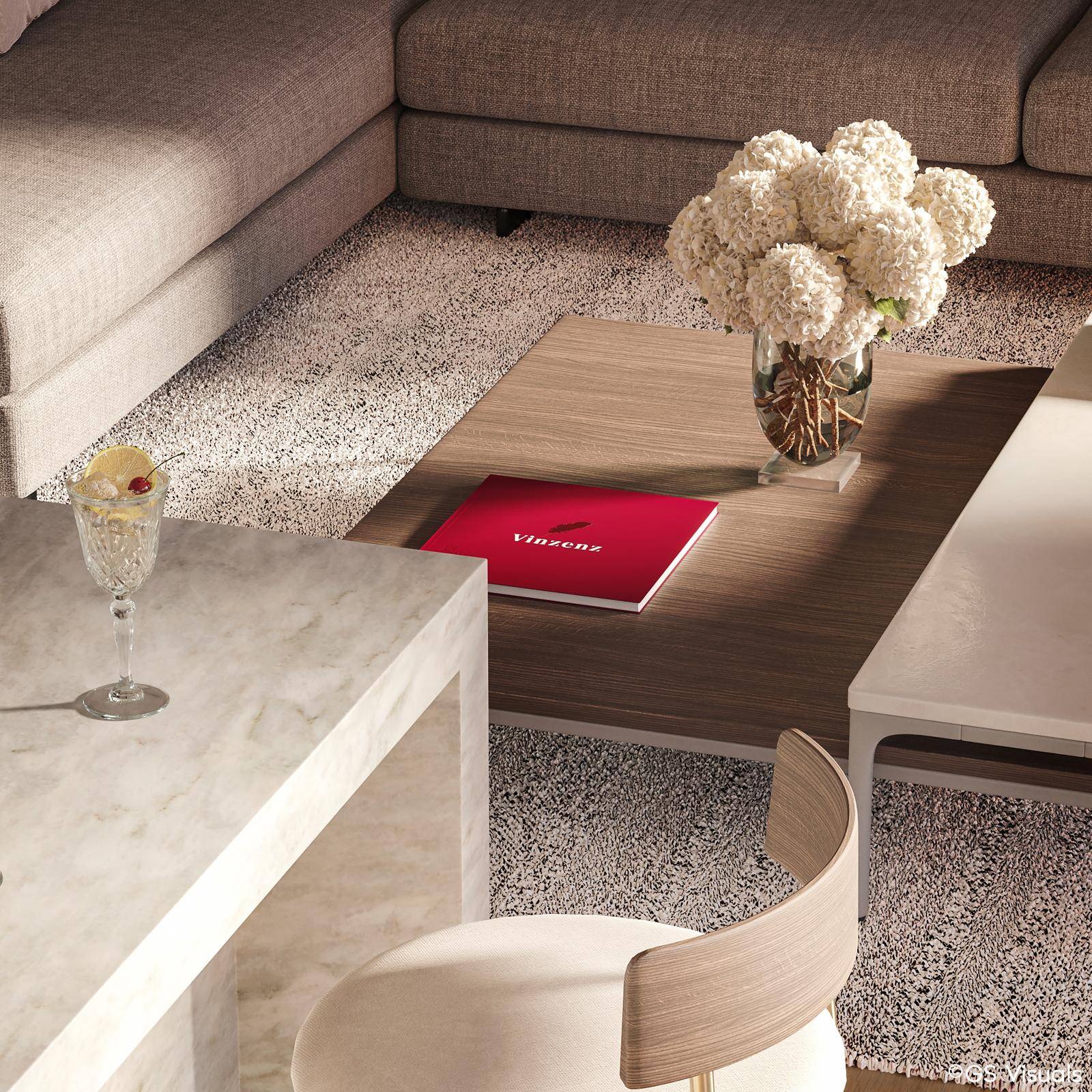 Detailaufnahme des Wohnbereichs mit bequemer Couch, eleganten Couchtischen und dekorativen Blumen.