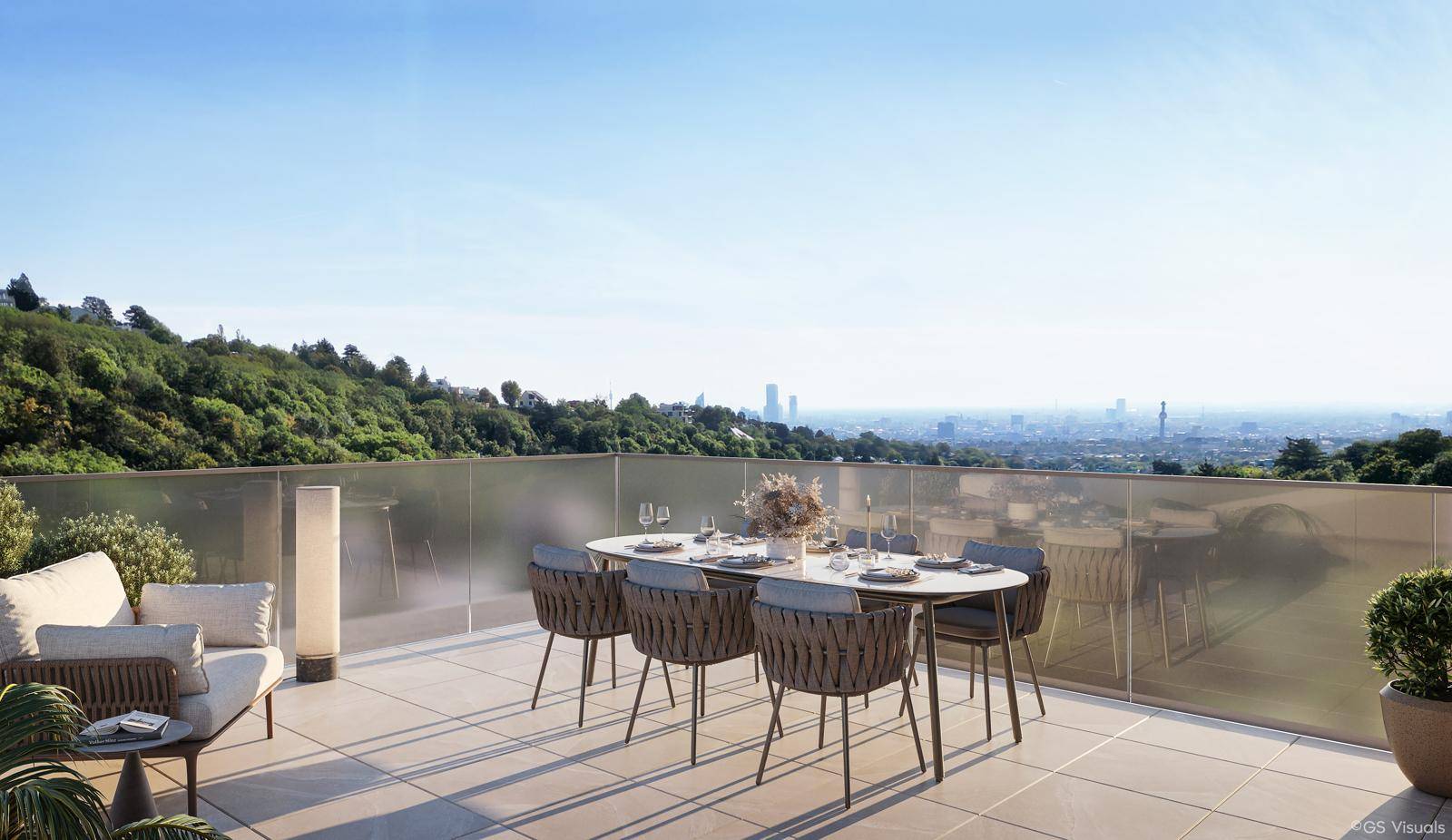 Großzügige Dachterrasse mit Essbereich und Lounge-Möbeln, bietet weiten Stadt- und Fernblick.