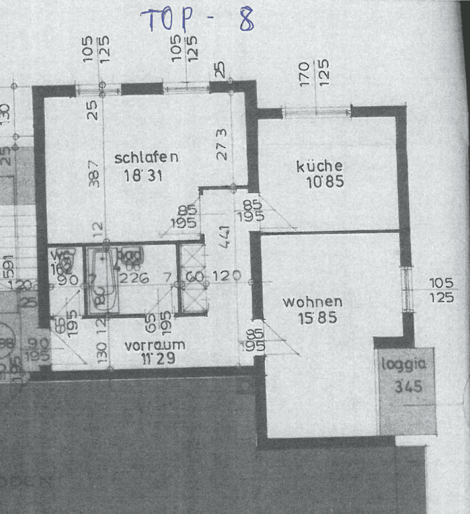 Grundriss einer Wohnung mit Schlafzimmer, Küche, Wohnzimmer und Loggia.