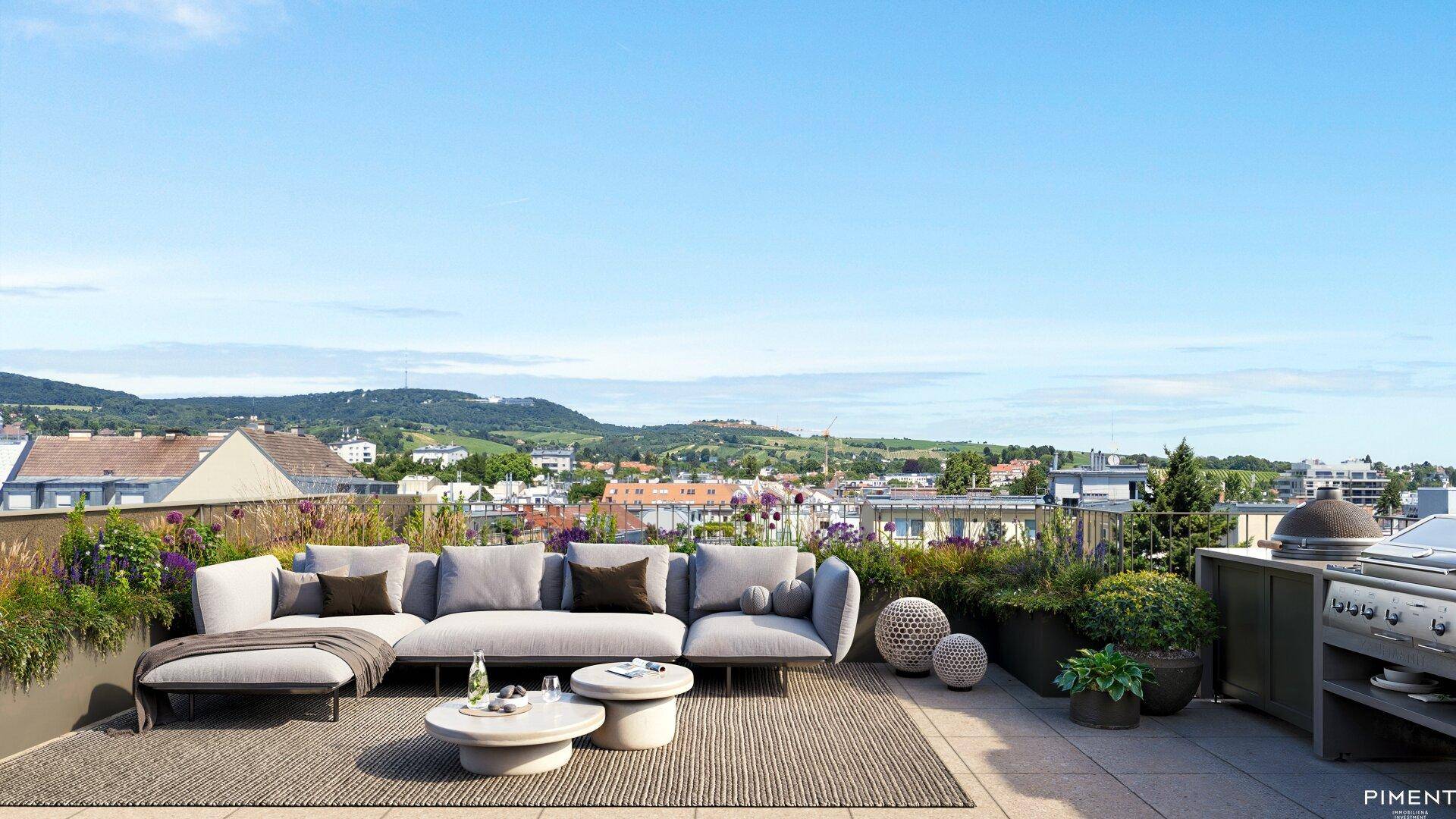 Großzügige Dachterrasse mit Lounge-Möbeln, Grillbereich und weitem Blick über die Stadt und Landschaft.