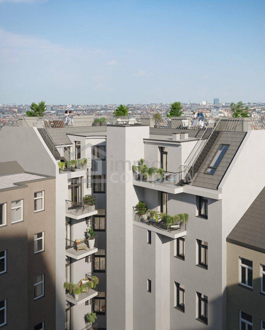 Dachterrassen und obere Etagen des modernen Gebäudes mit weitem Blick über die Stadt.