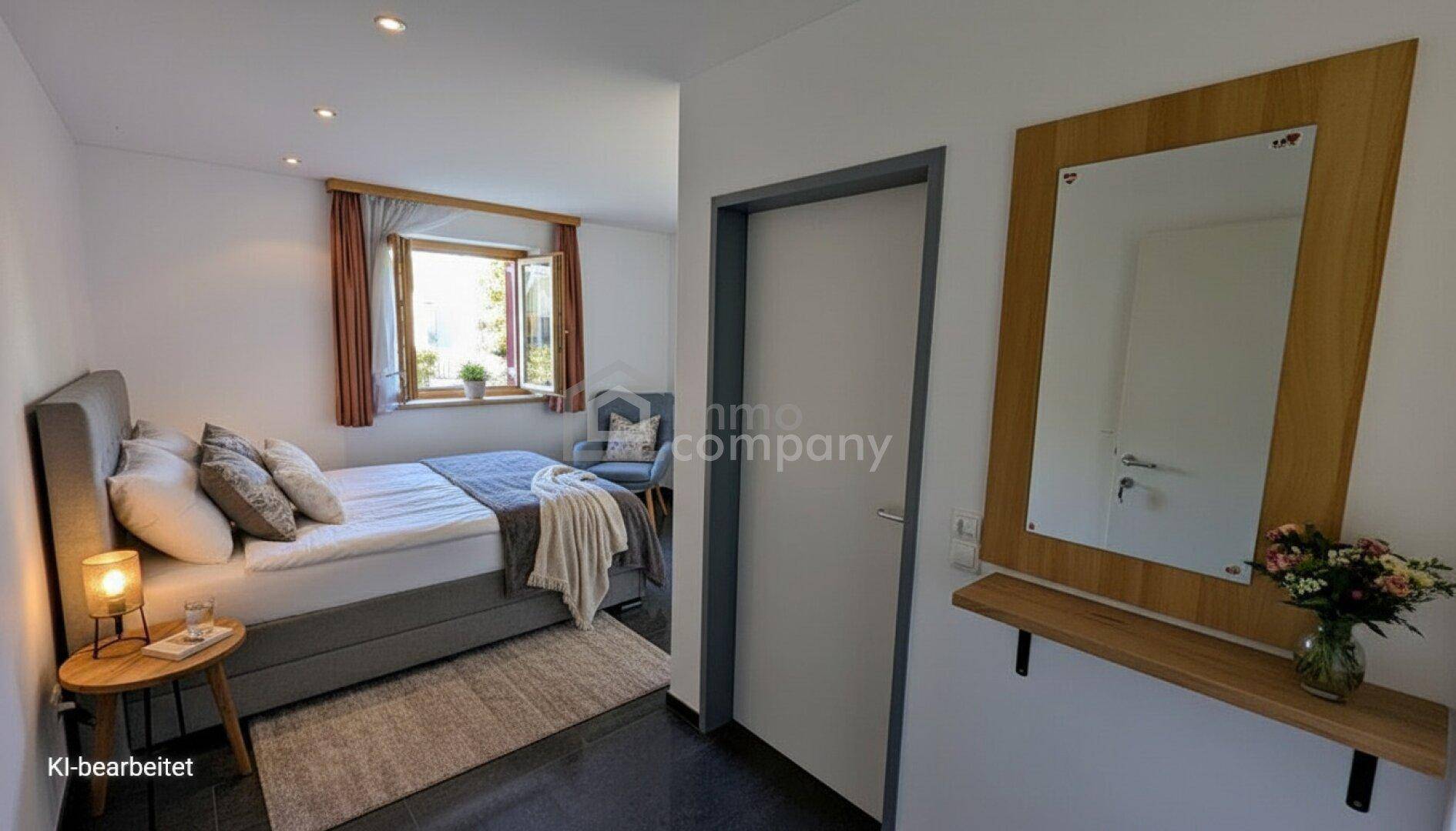 Gemütliches Gästezimmer mit dunklem Fliesenboden und moderner Einrichtung.