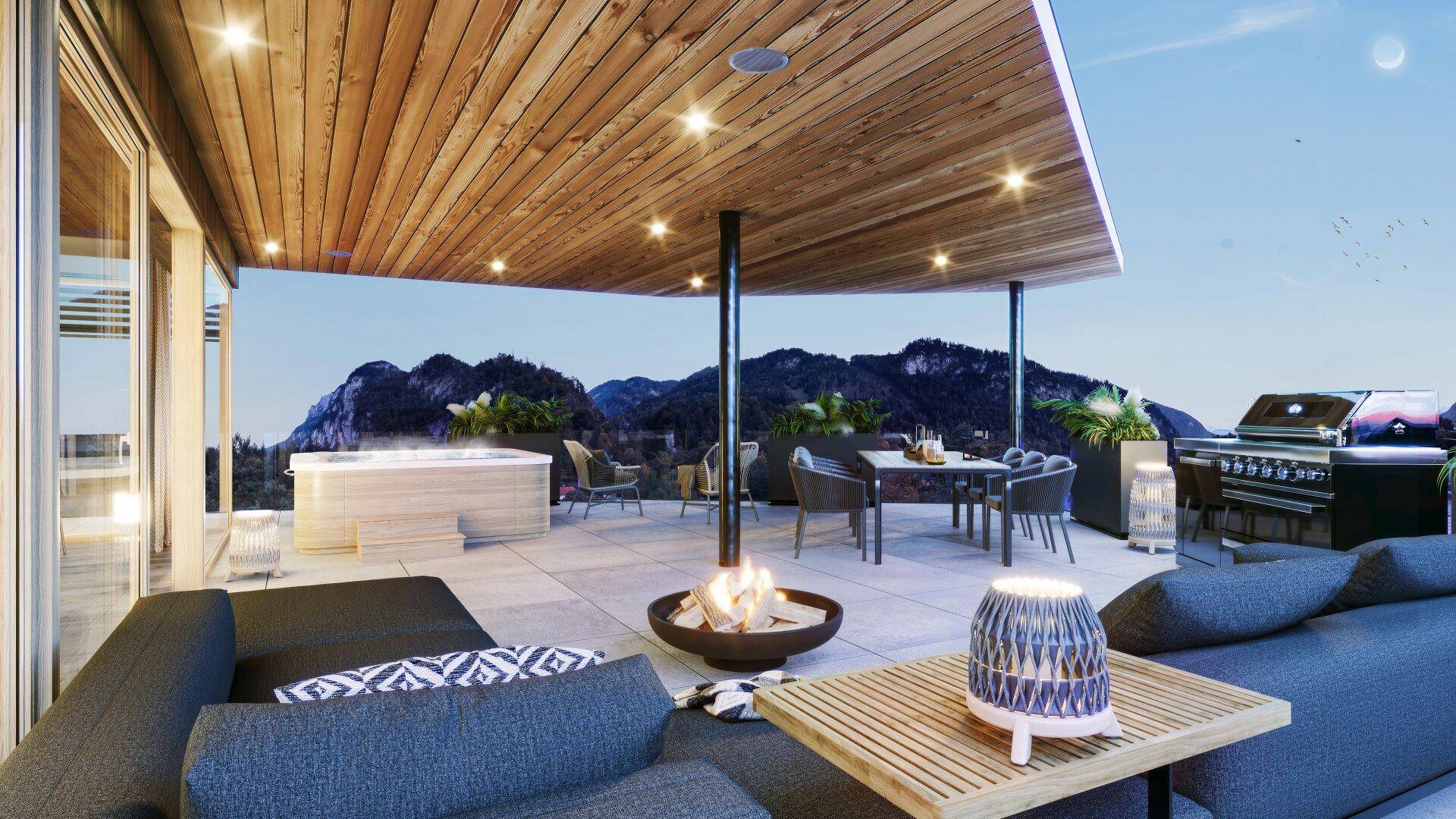 Moderne Dachterrasse mit Whirlpool, Feuerstelle, Grill und Bergblick, ideal für Entspannung und Unterhaltung.