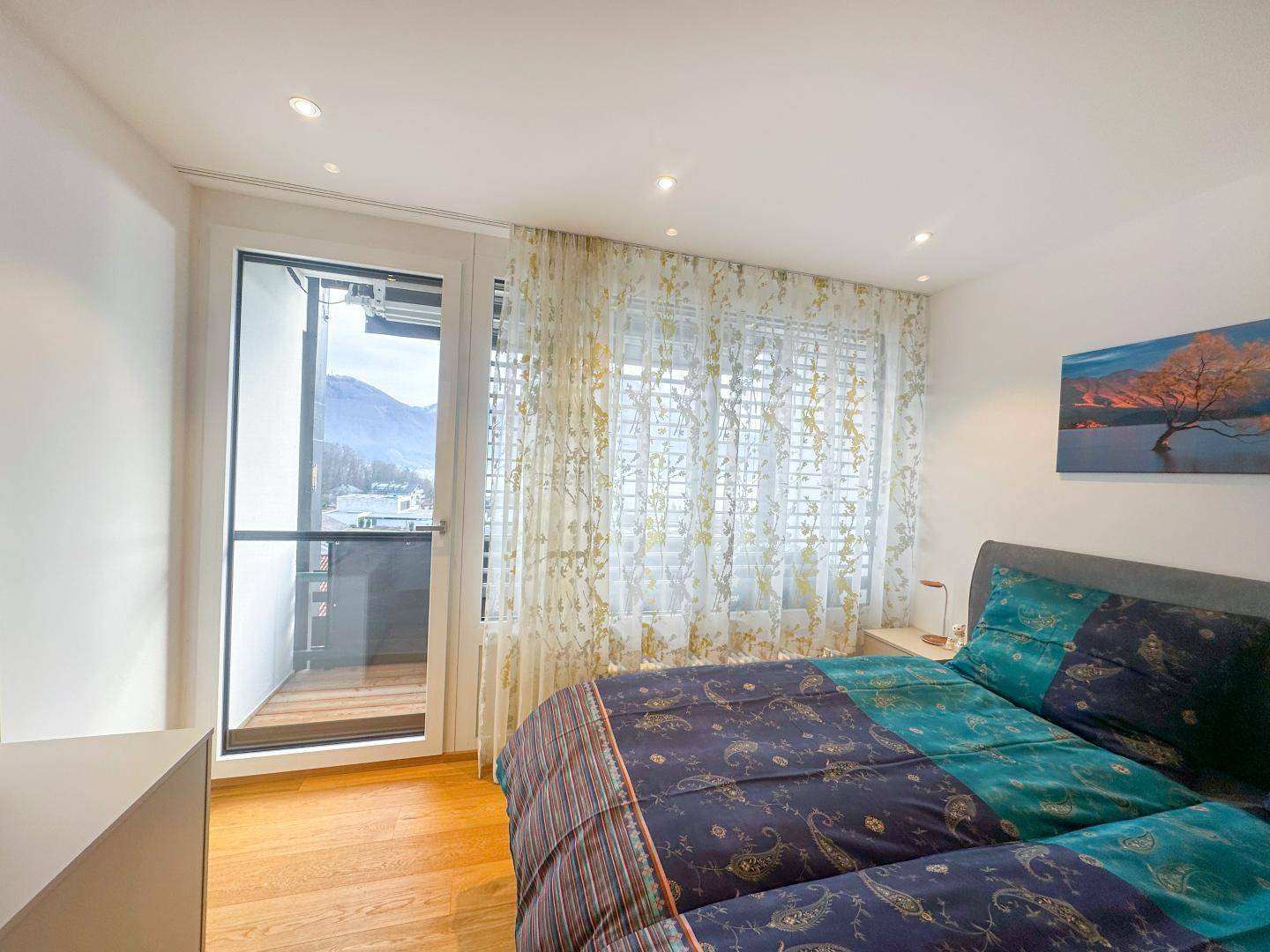 Schlafzimmer mit Seeblick