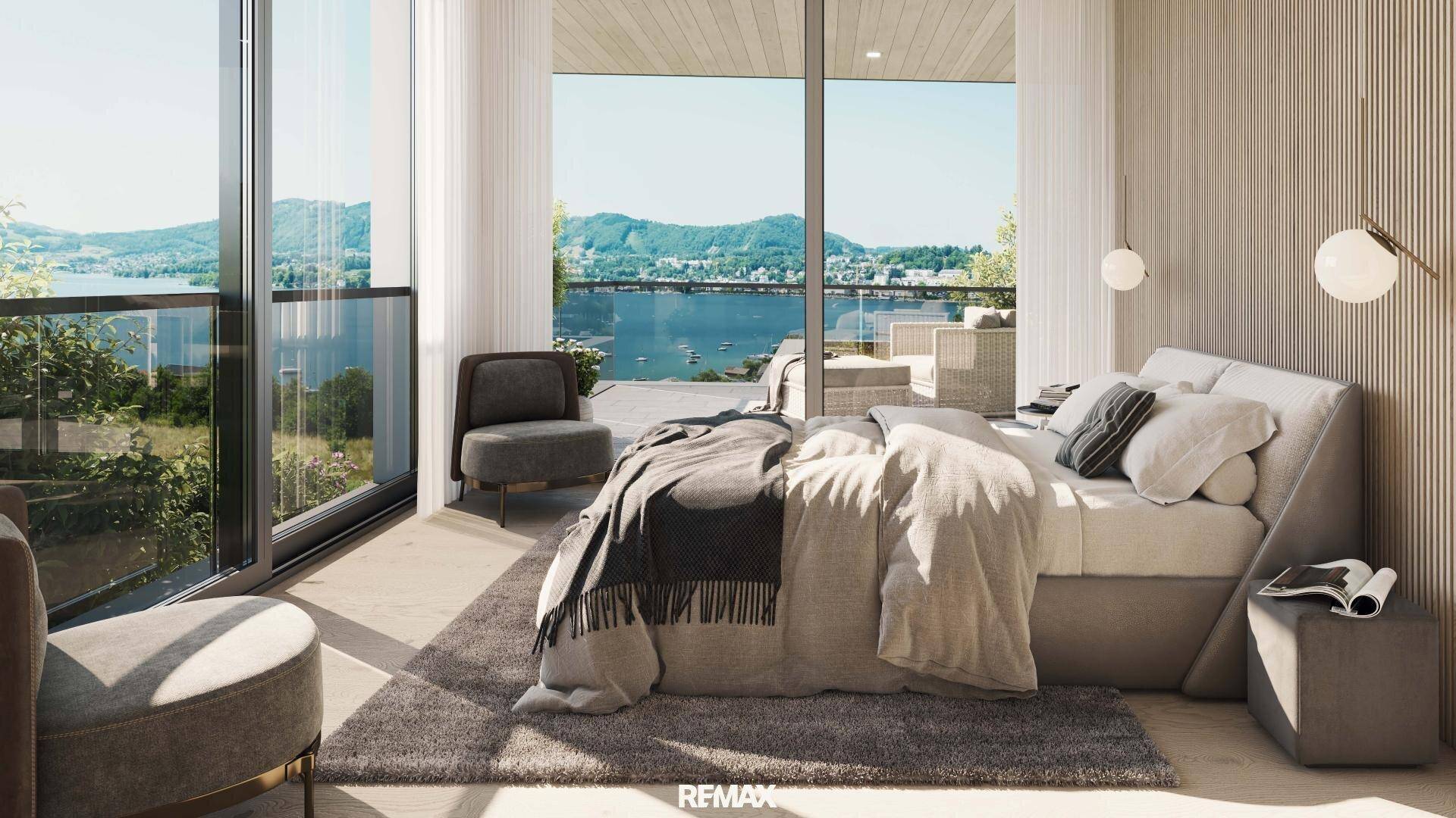 Modernes Schlafzimmer mit Seeblick, großen Fenstern und Zugang zum Außenbereich.