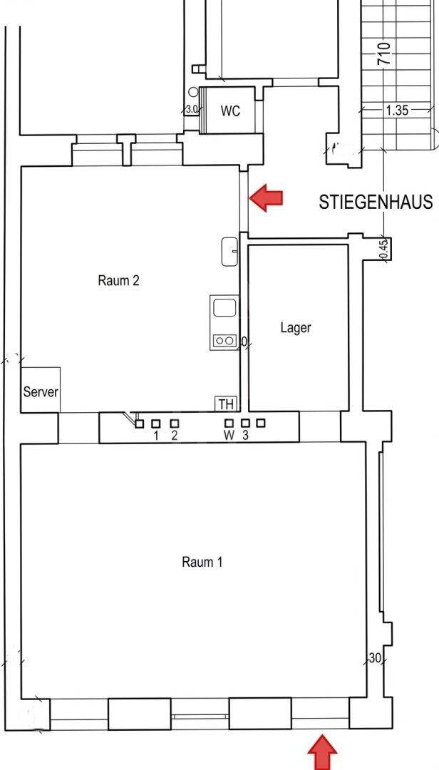Grundrissplan eines Gewerbeobjekts mit zwei Haupträumen, Lager und WC.