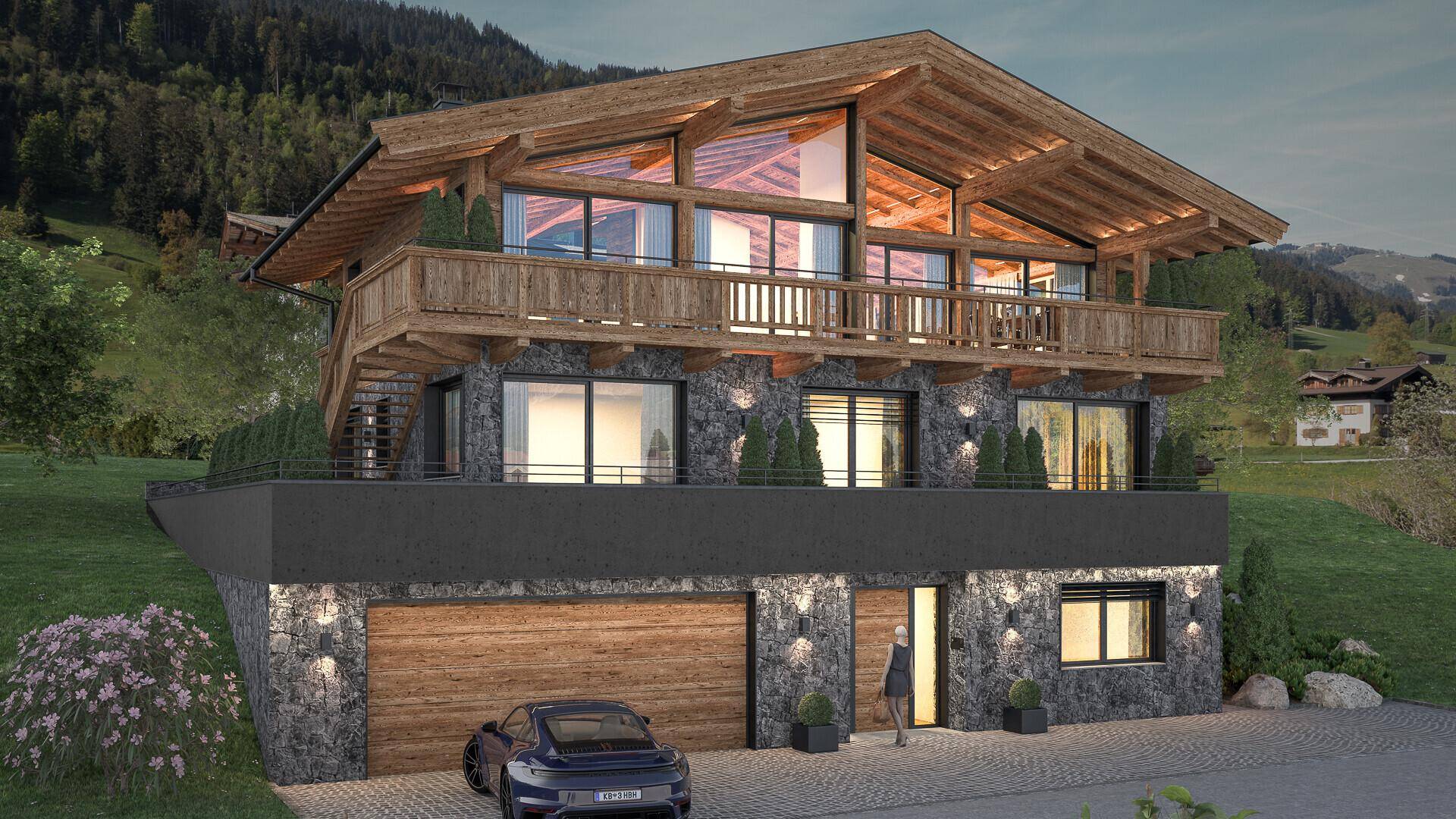 Luxuriöses Chalet mit beleuchteter Steinfassade, Holzdetails und großzügigen Fensterfronten am Abend.