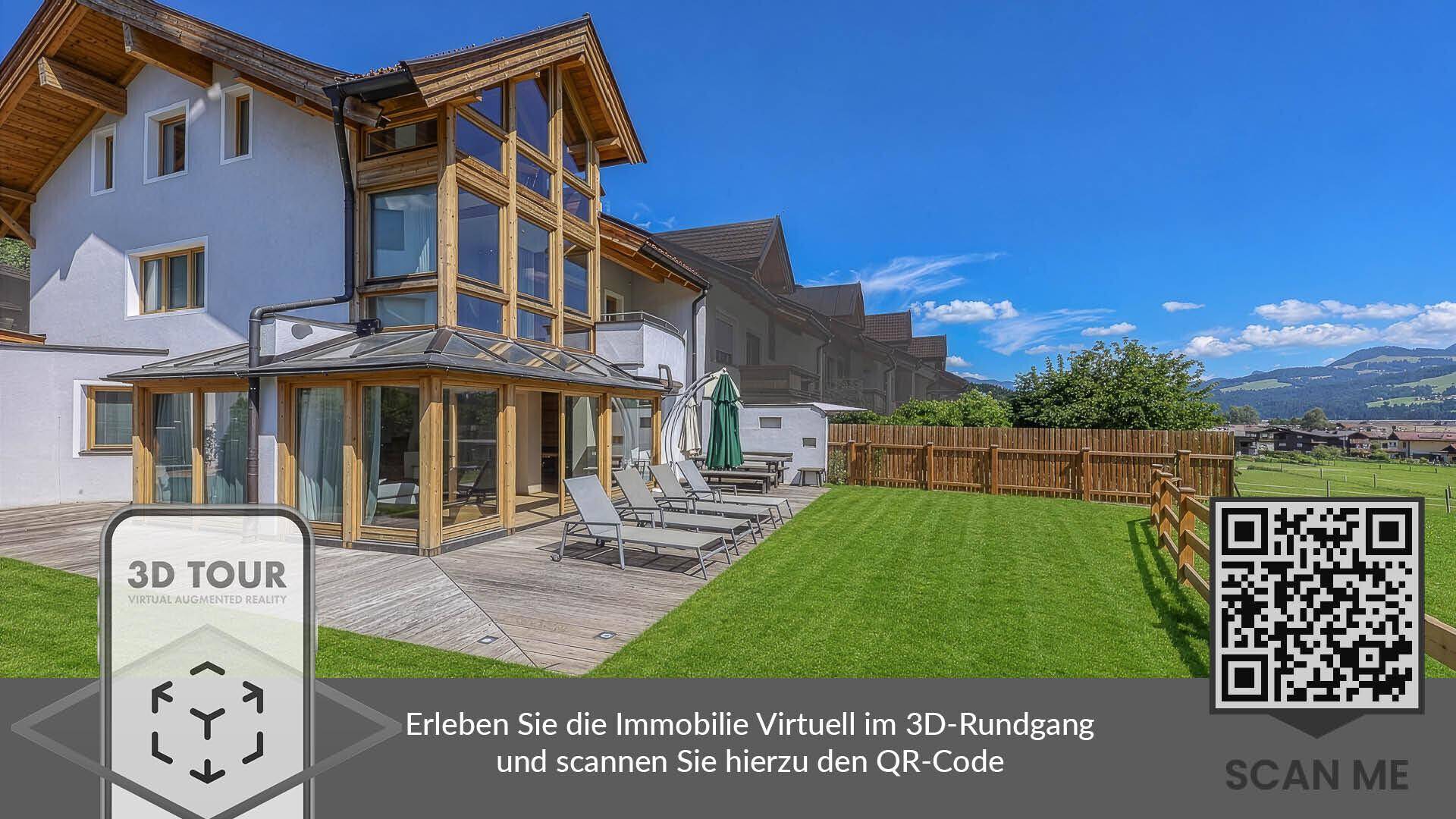 Moderne Villa mit Wintergarten, großer Sonnenterrasse, gepflegtem Garten und herrlichem Bergblick.