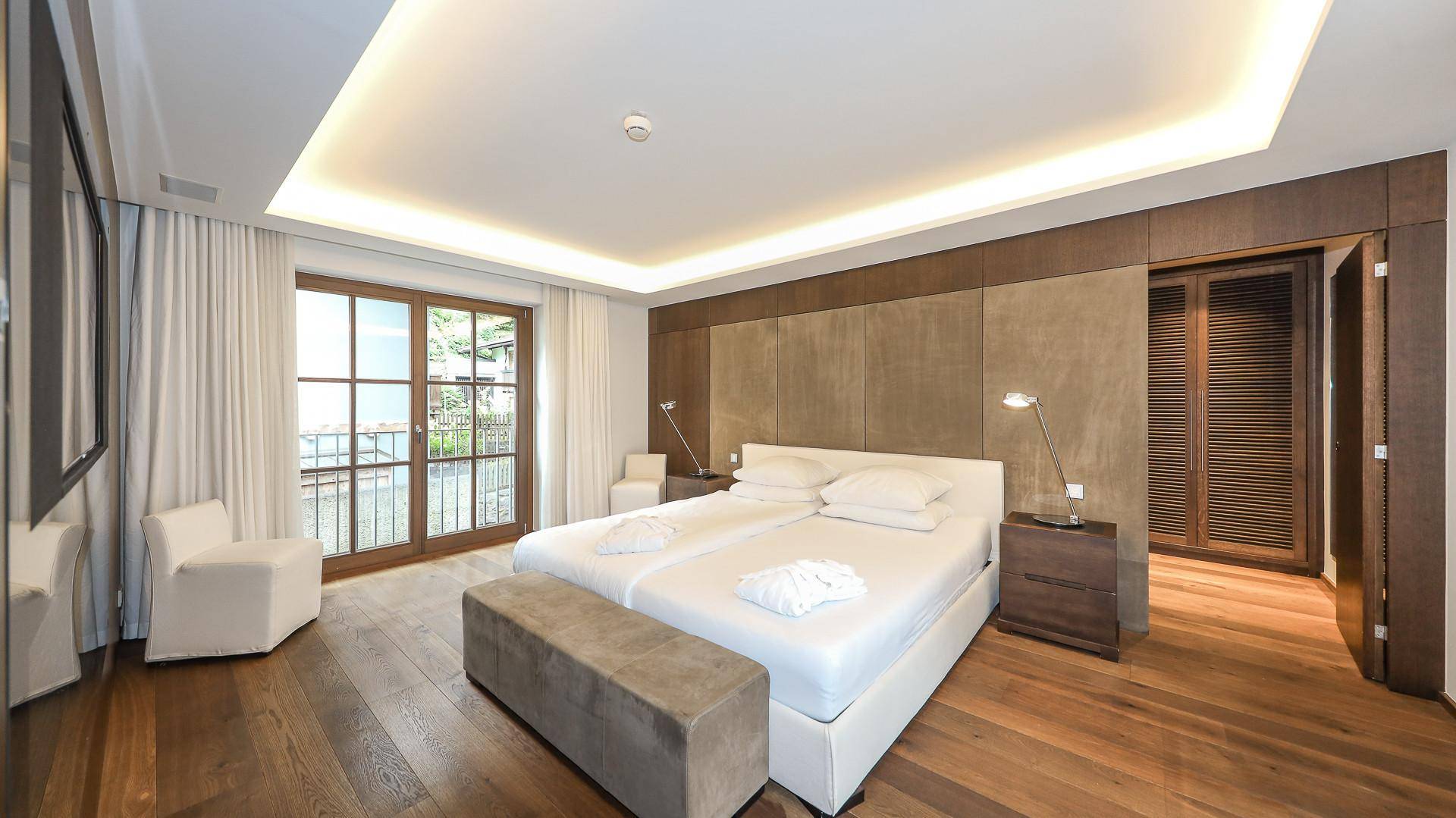 KITZIMMO-Luxus-Suite mit Zugang in ein 5-Sterne-Hotel - Immobilien Kitzbühel.