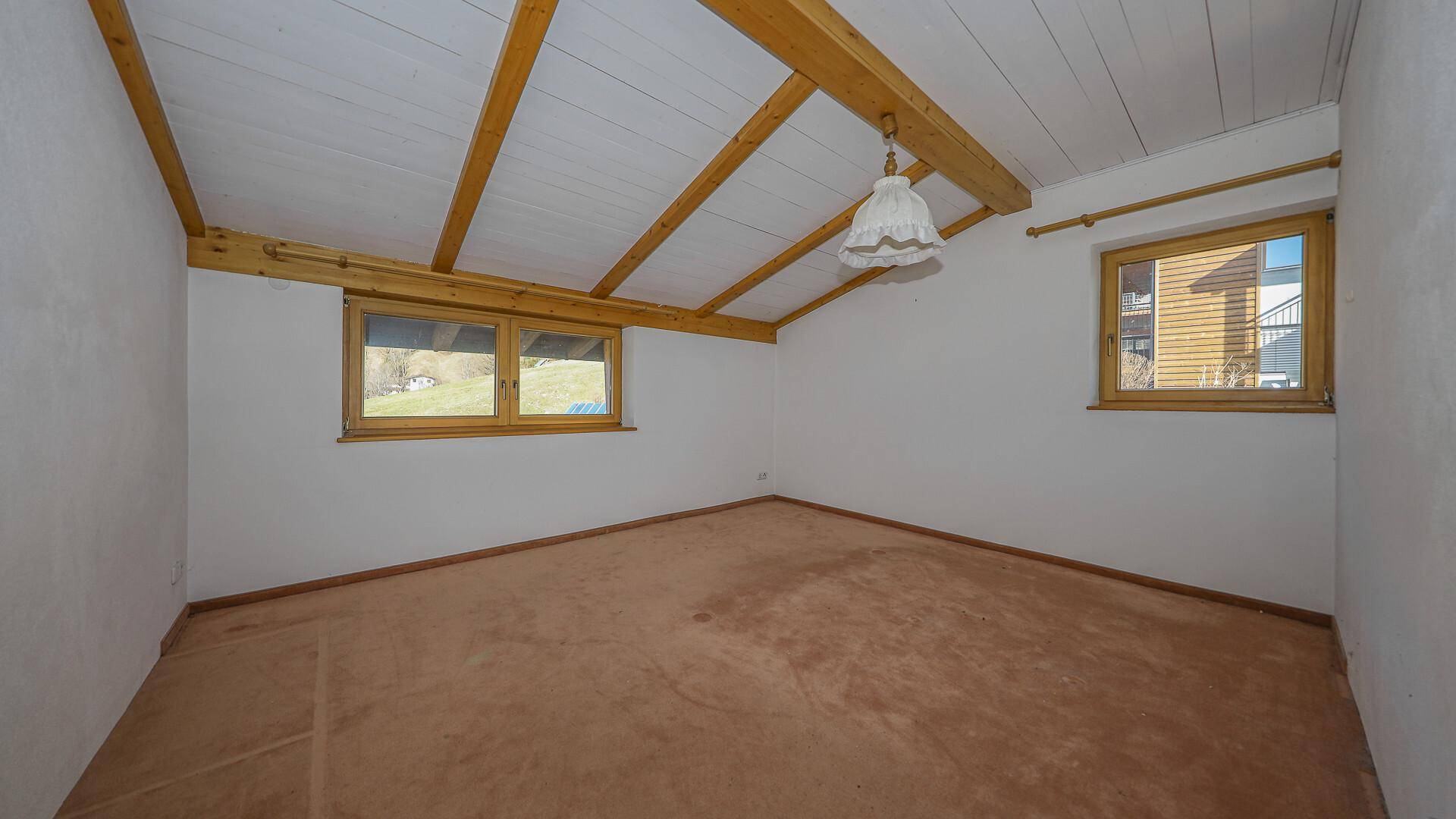 KITZIMMO-Baugrundstück mit Altbestand in Toplage - Immobilien Brixen im Thale.