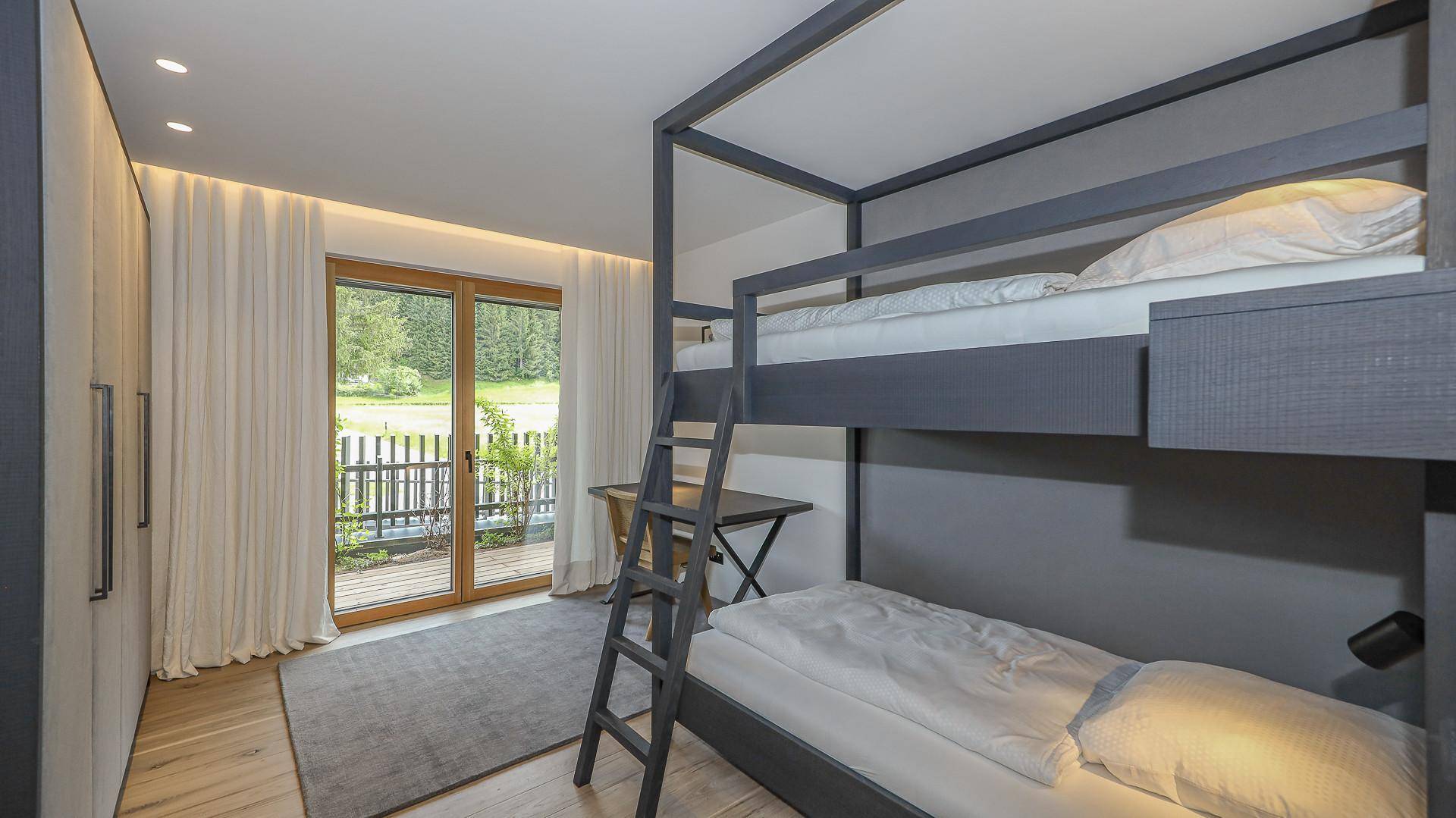 KITZIMMO-Riverside - Luxus-Garden-Suite in Toplage kaufen - Immobilien Kirchberg.