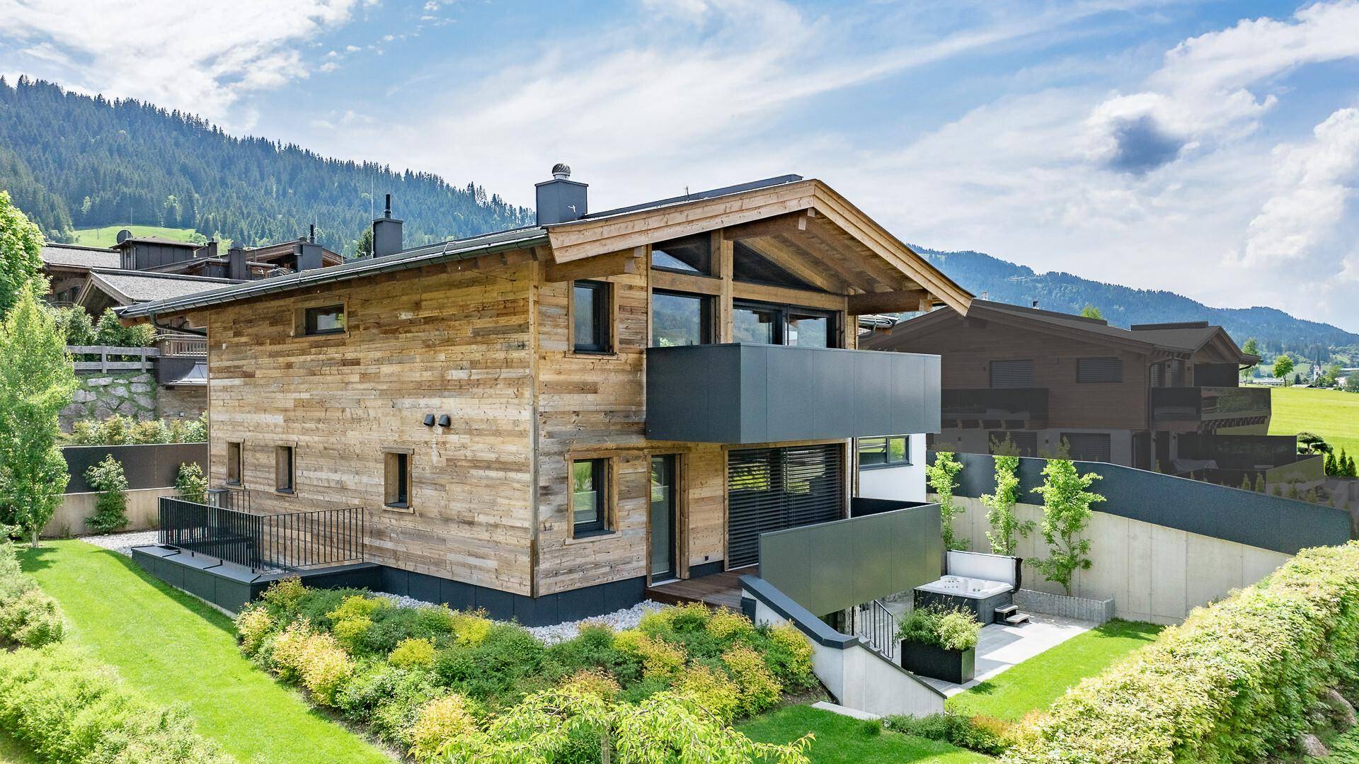 KITZIMMO-Exklusive Luxusvilla mit Kaiserblick in Toplage - Immobilien Going.