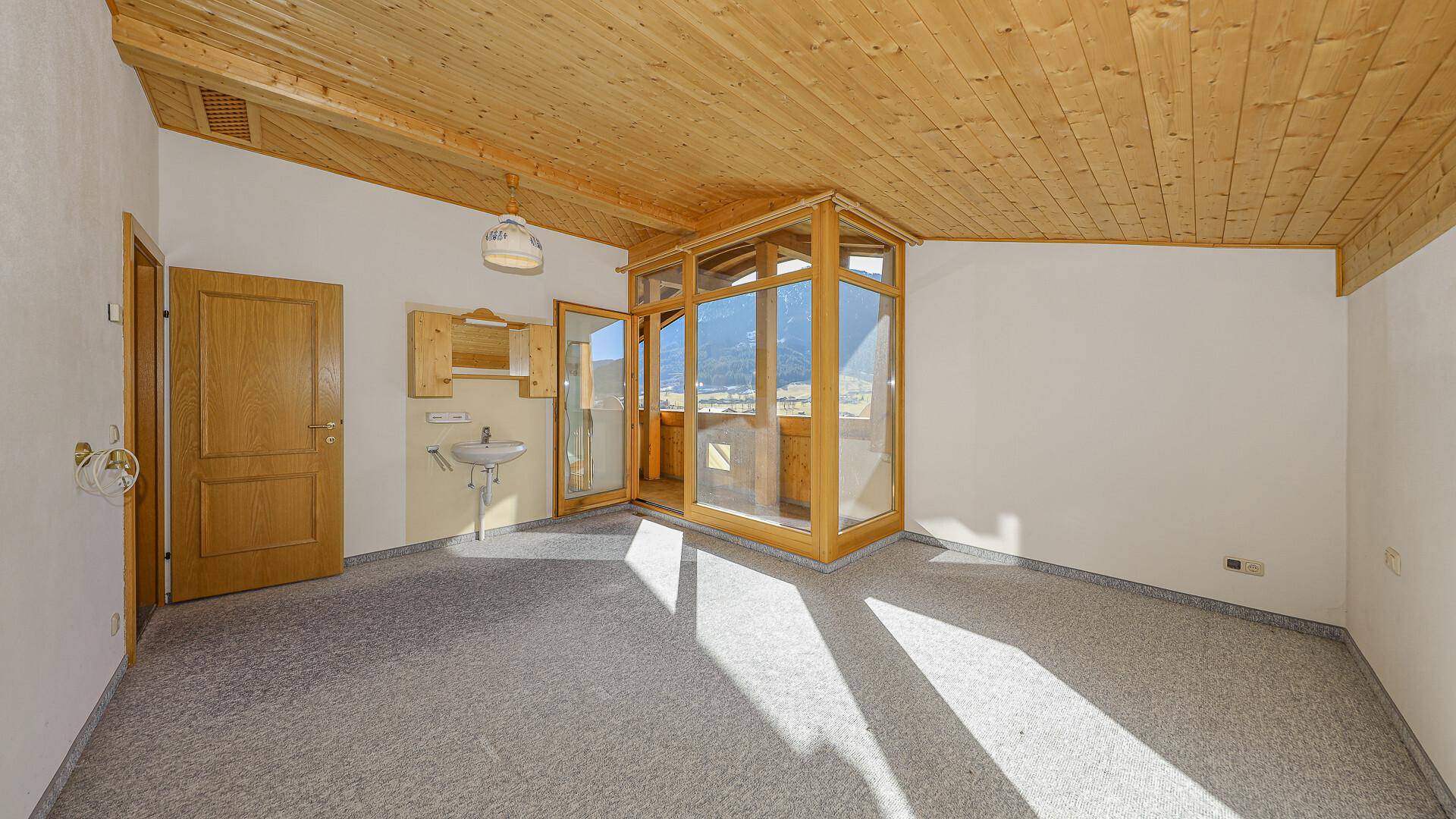 KITZIMMO-Baugrundstück mit Altbestand in Toplage - Immobilien Brixen im Thale.