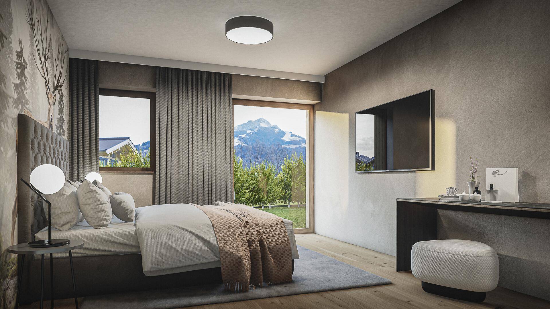 Helles Schlafzimmer mit Holzboden, großem Fenster und direktem Zugang zum Garten mit Bergblick.