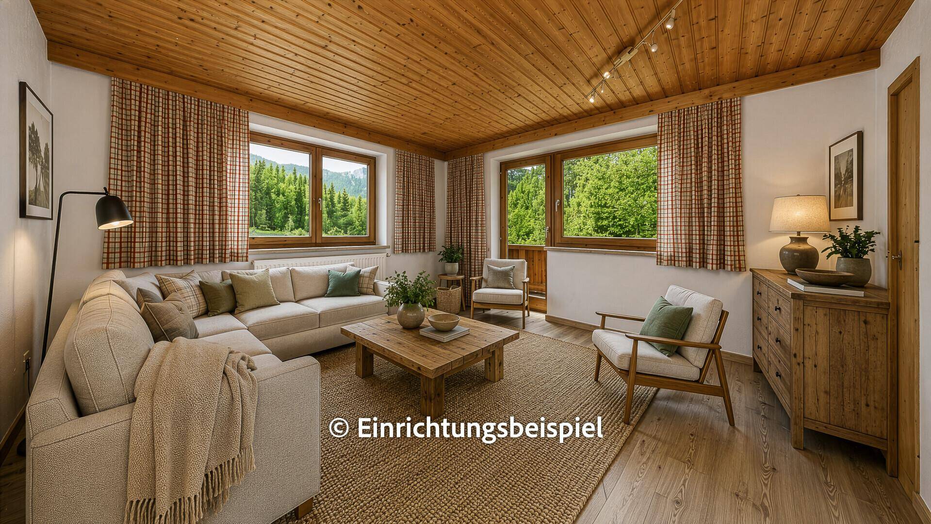 Gemütliches Wohnzimmer mit Holzbalkendecke, bequemen Sofas und Bergblick.