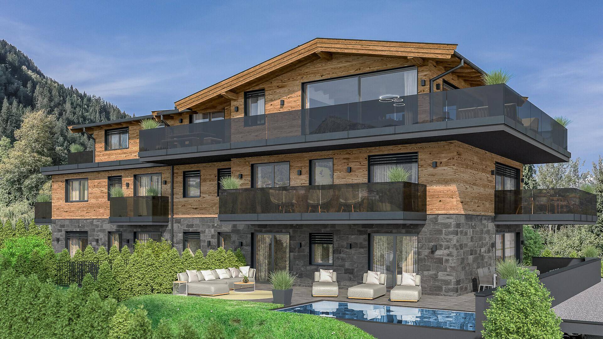 Moderne Chalet-Architektur mit Glasbalkonen, Steinfassade und einem kleinen Poolbereich im Freien.