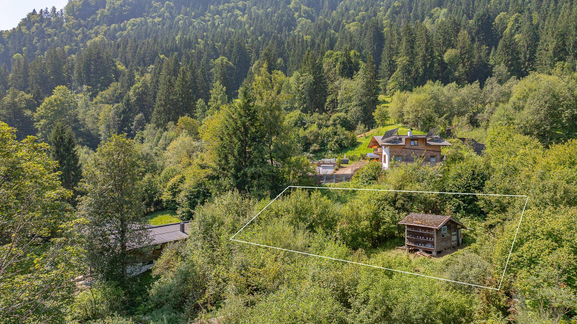 KITZIMMO-Grundstück für Einheimische in sonniger Ruhelage kaufen - Immobilien Kitzbühel.
