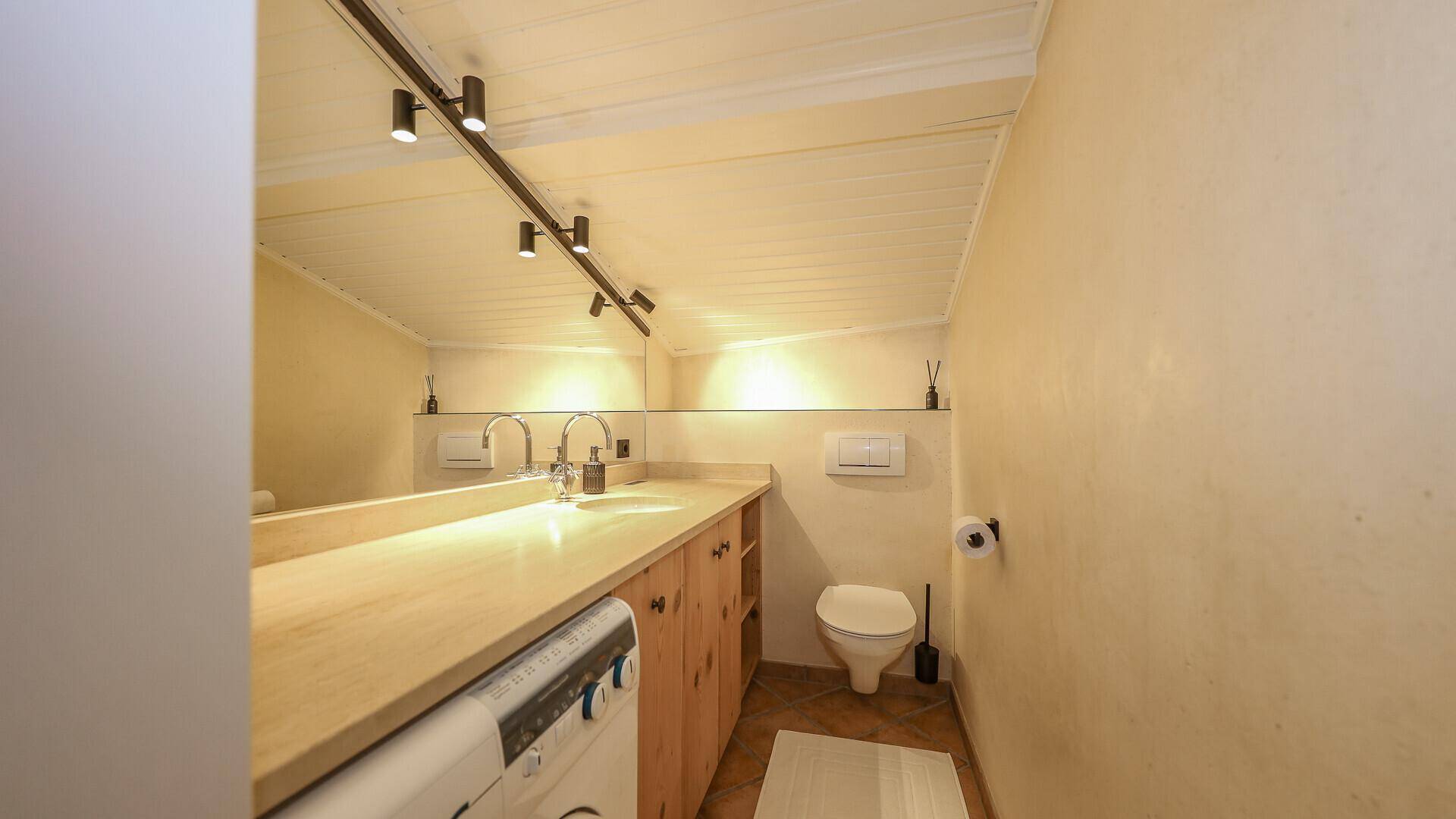 KITZIMMO-Dachgeschosswohnung mit Lift und Tiefgarage im Zentrum - Immobilien Kitzbühel.