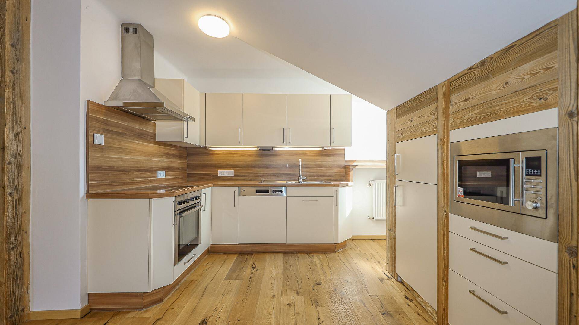KITZIMMO-Renovierte Dachgeschosswohnung im Zentrum kaufen - Immobilien Kirchberg.