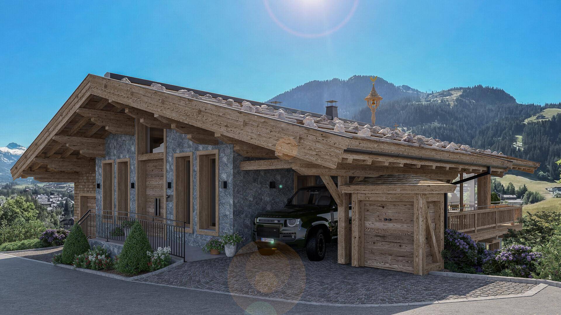 Modernes Chalet mit Holzfassade, Carport und beeindruckendem Bergblick.
