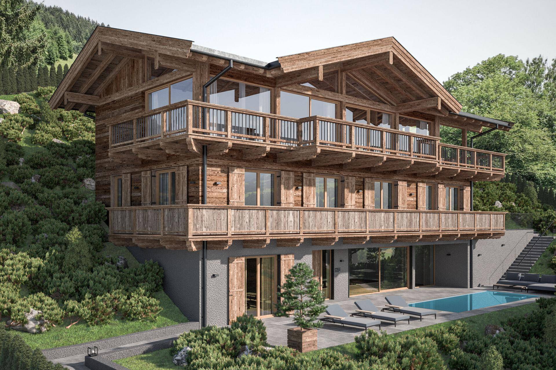 Luxuriöses Holzchalet mit mehreren Balkonen, großzügiger Poolterrasse und Bergblick.