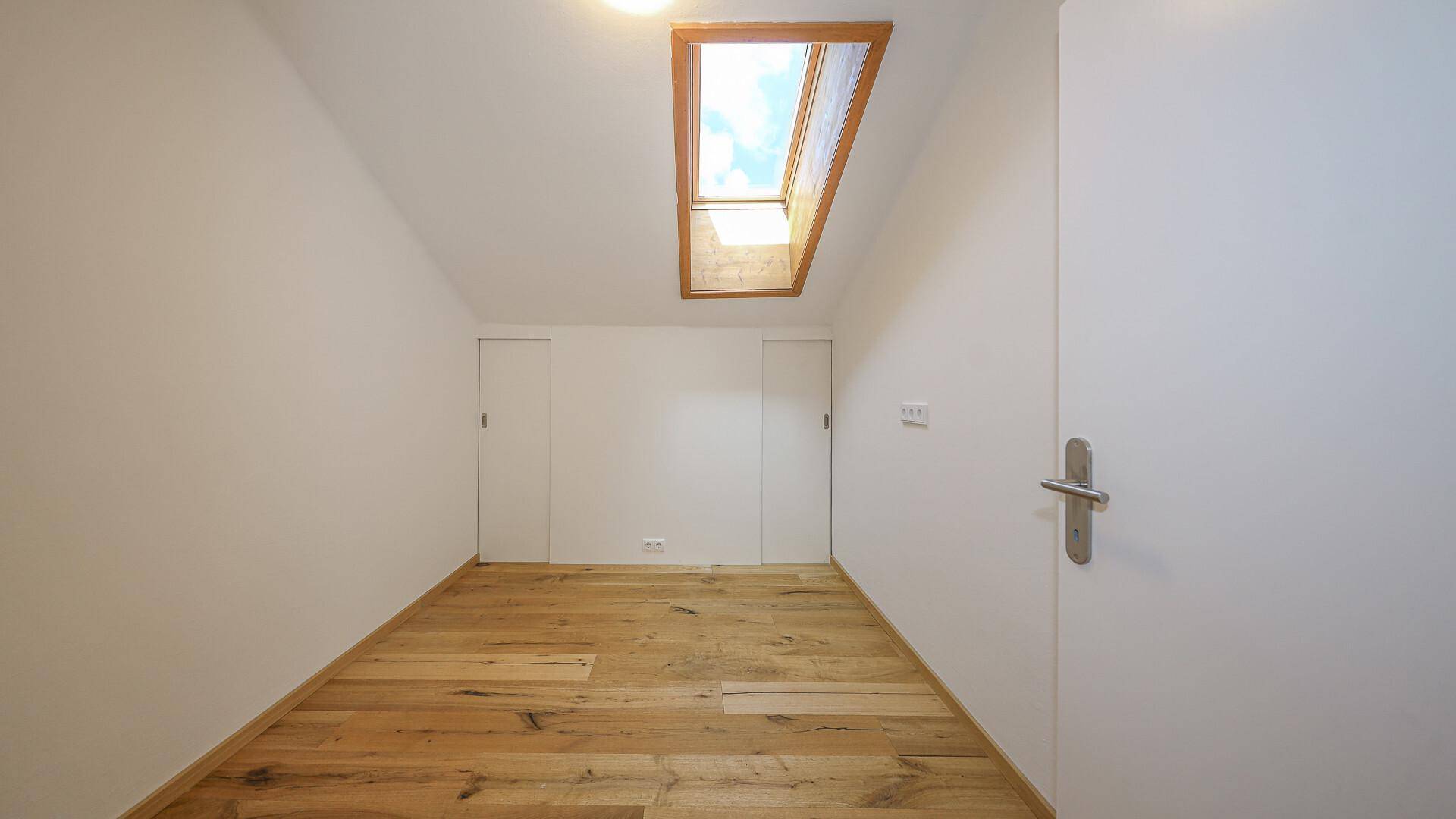 KITZIMMO-Renovierte Dachgeschosswohnung im Zentrum kaufen - Immobilien Kirchberg.