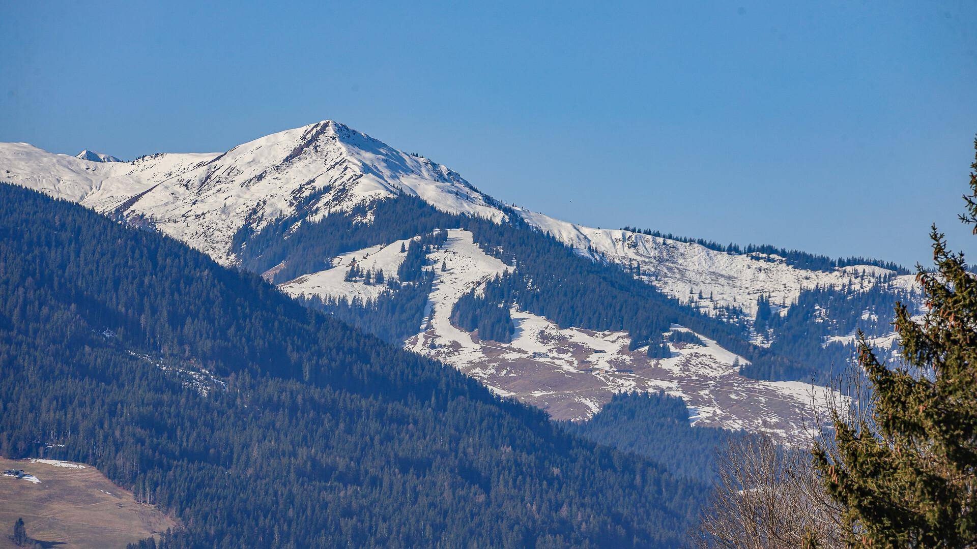 KITZIMMO-Baugrundstück mit Altbestand in Toplage - Immobilien Brixen im Thale.