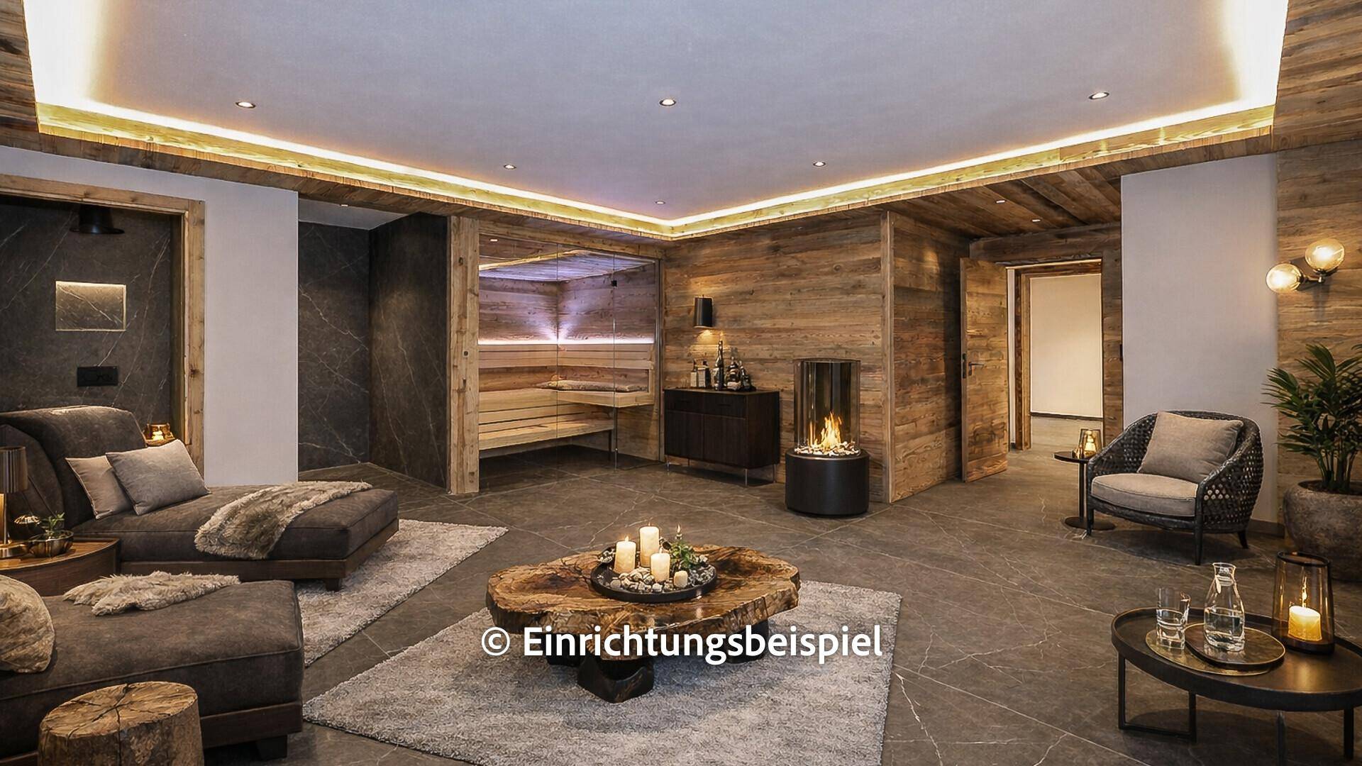 Exklusiver Wellnessbereich mit Sauna, Kamin und komfortablen Liegemöglichkeiten.