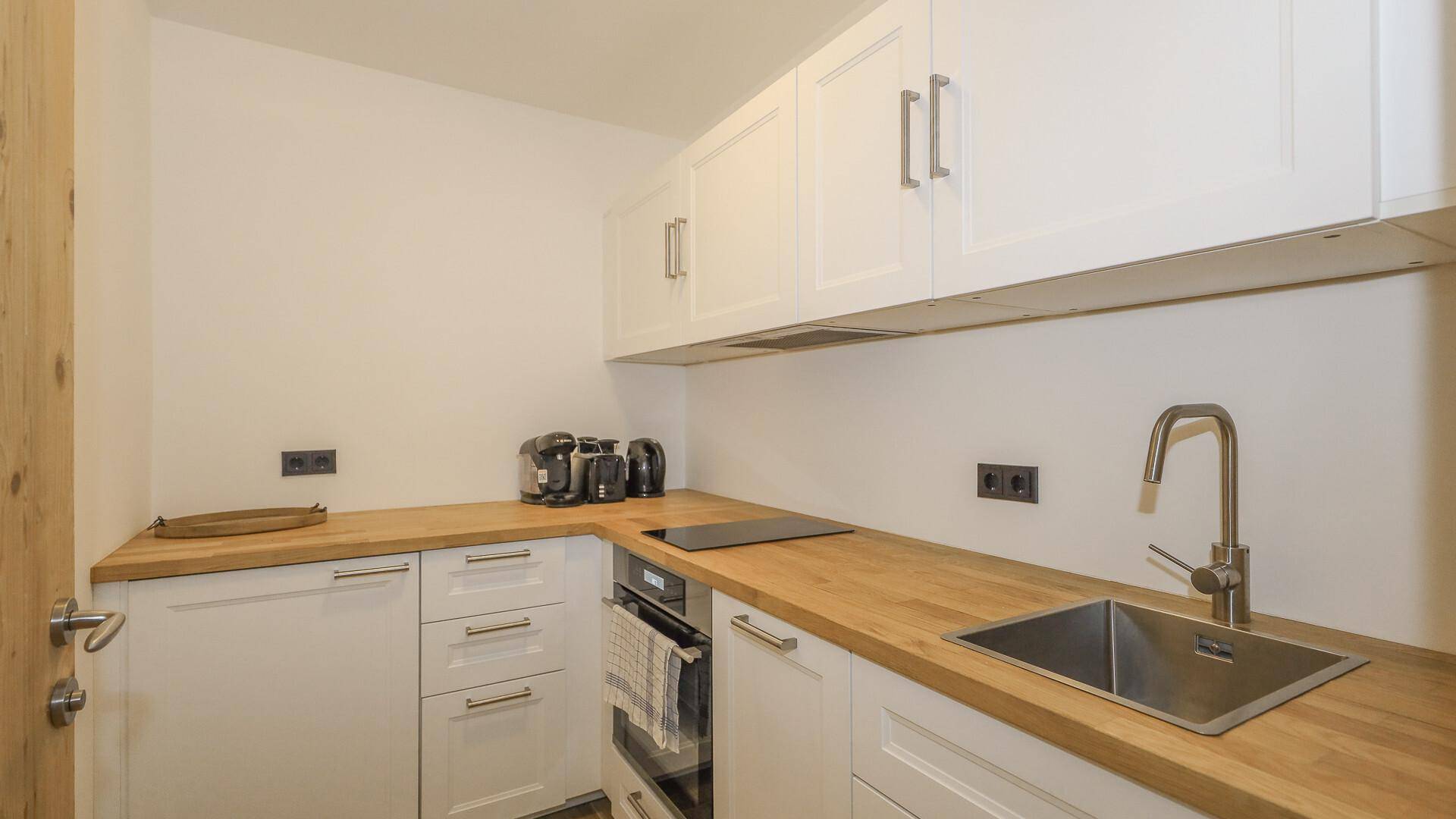 KITZIMMO-Garten Apartment mit touristischer Widmung kaufen - Immobilien Kitzbühel.