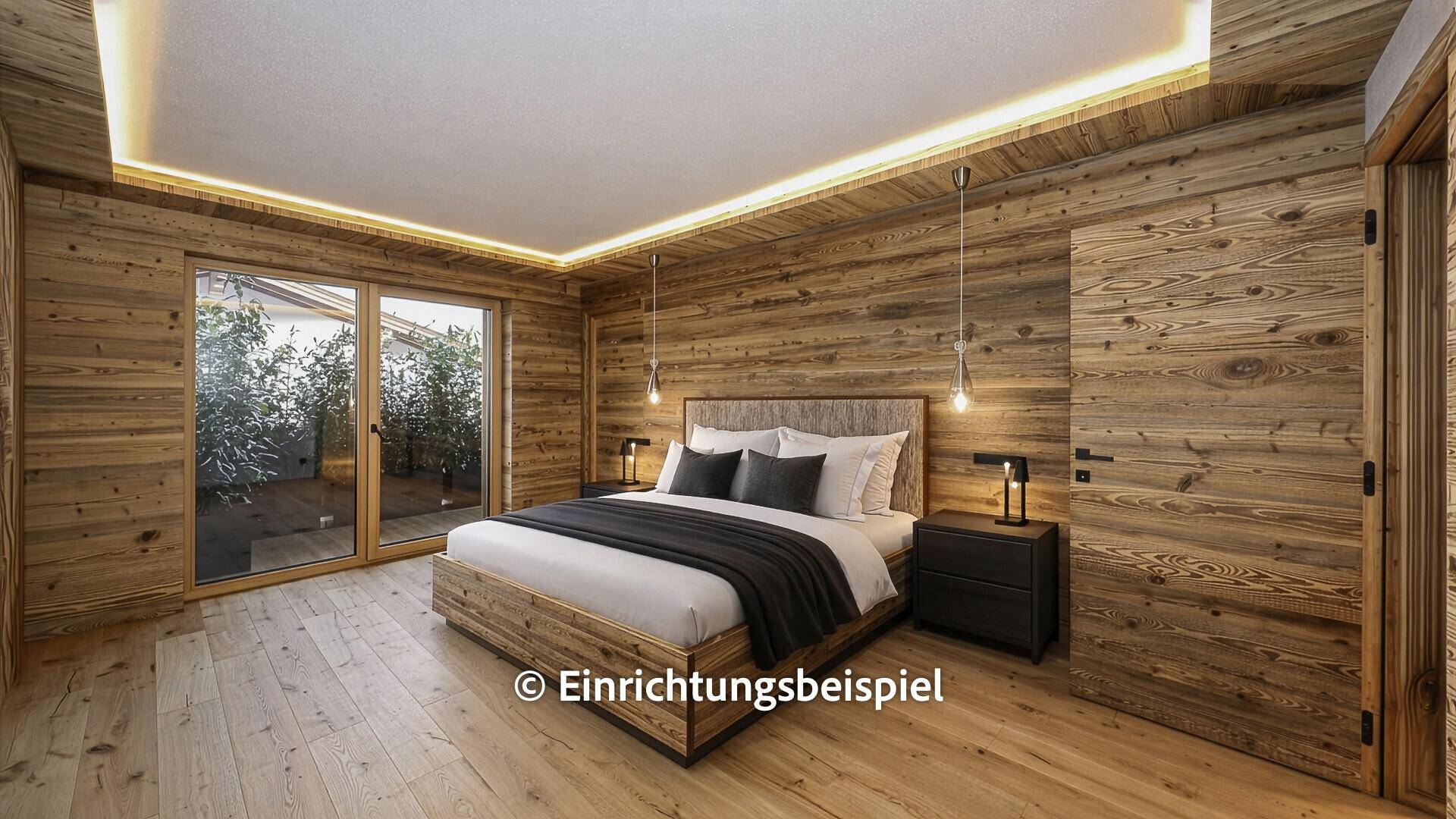 Gemütliches Schlafzimmer mit Holzwänden, Parkettboden und Zugang zur Terrasse.