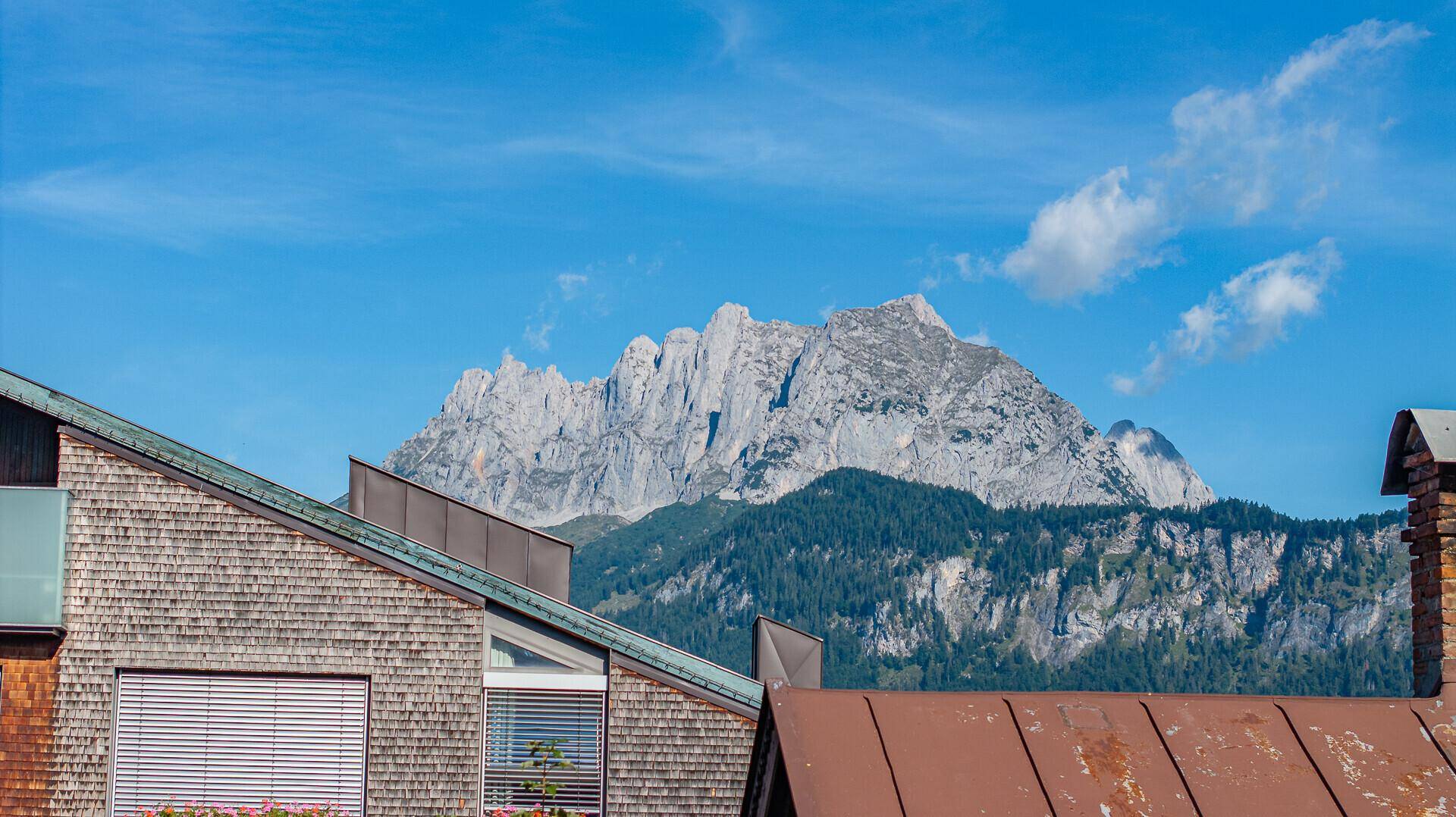 KITZIMMO-Baugrund in zentraler Toplage mit Apparthotel Projektierung - Immobilien St. Johann.