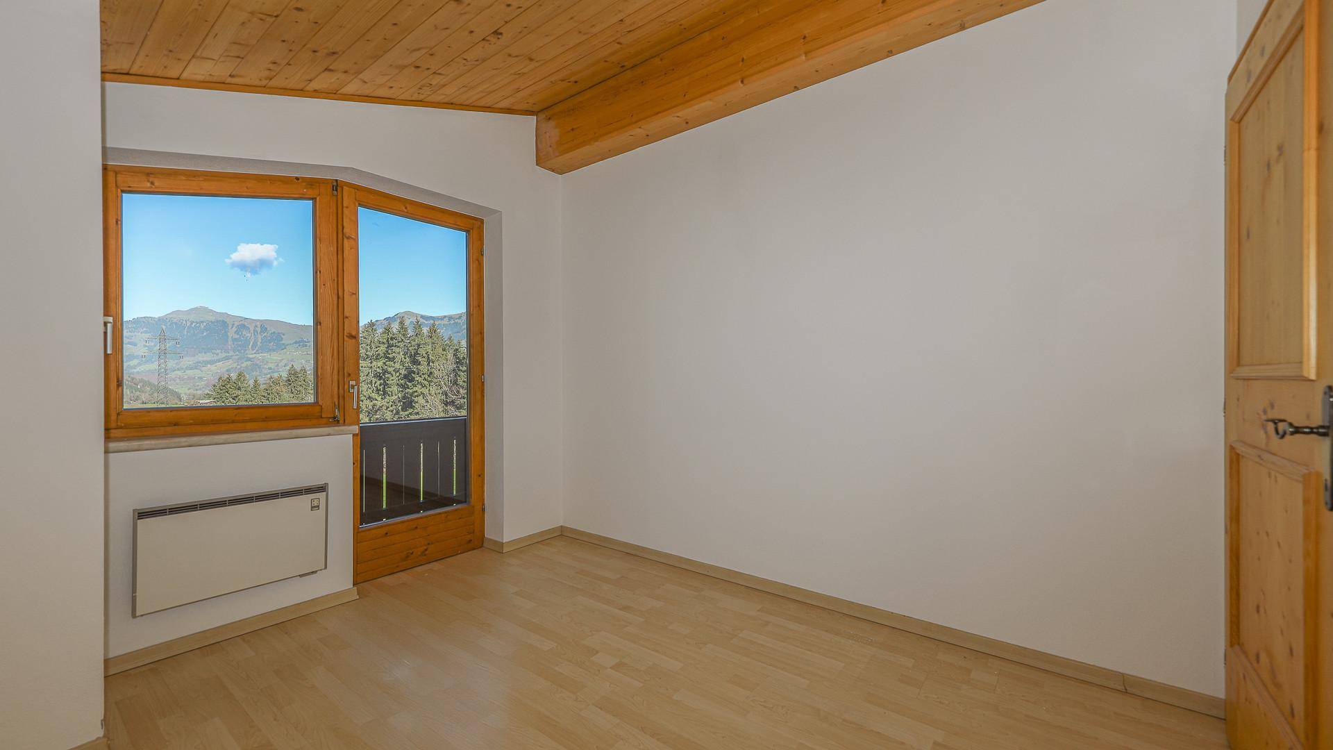 KITZIMMO-Dachgeschosswohnung in sonniger Ruhelage - Immobilien Jochberg.