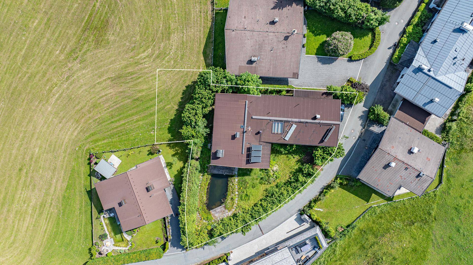 KITZIMMO-Grundstück mit Altbestand in sonniger Ruhelage kaufen - Immobilien Kirchberg.
