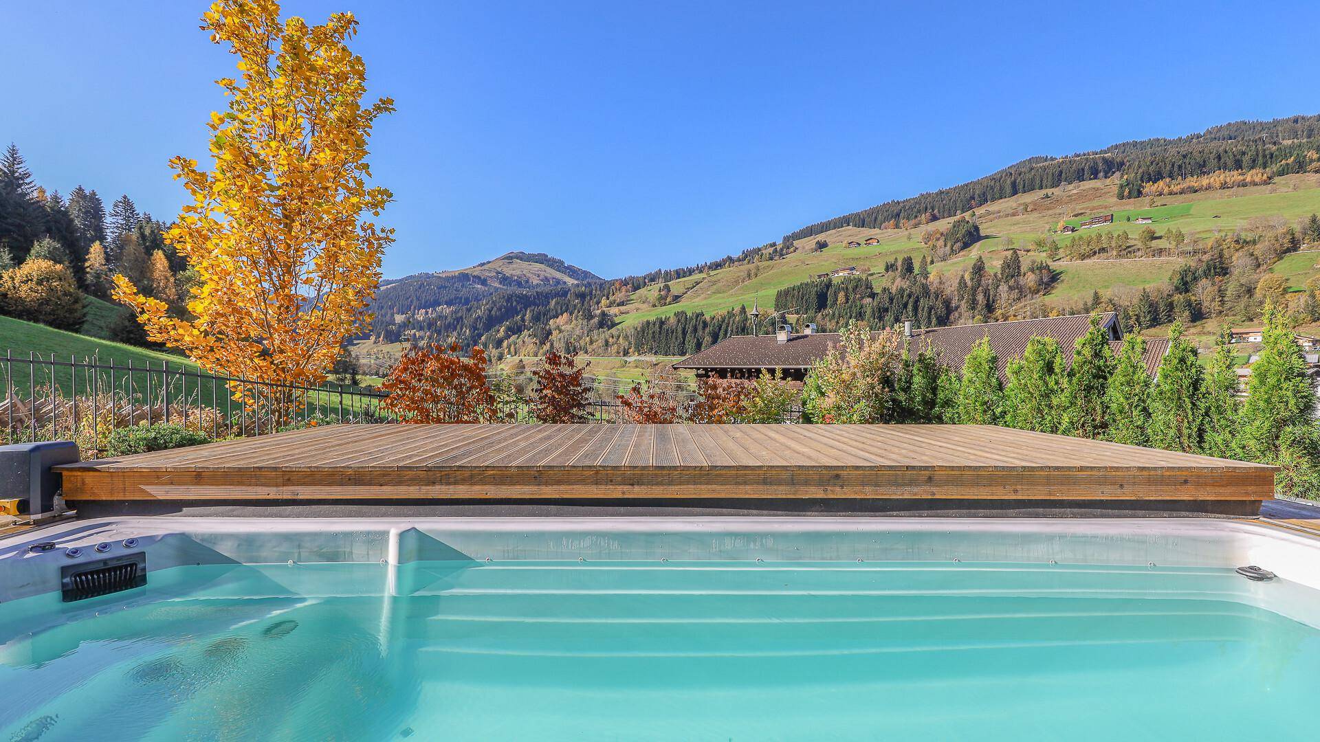 KITZIMMO-Luxuswohnung mit Pool in Toplage kaufen - Immobilie Jochberg.