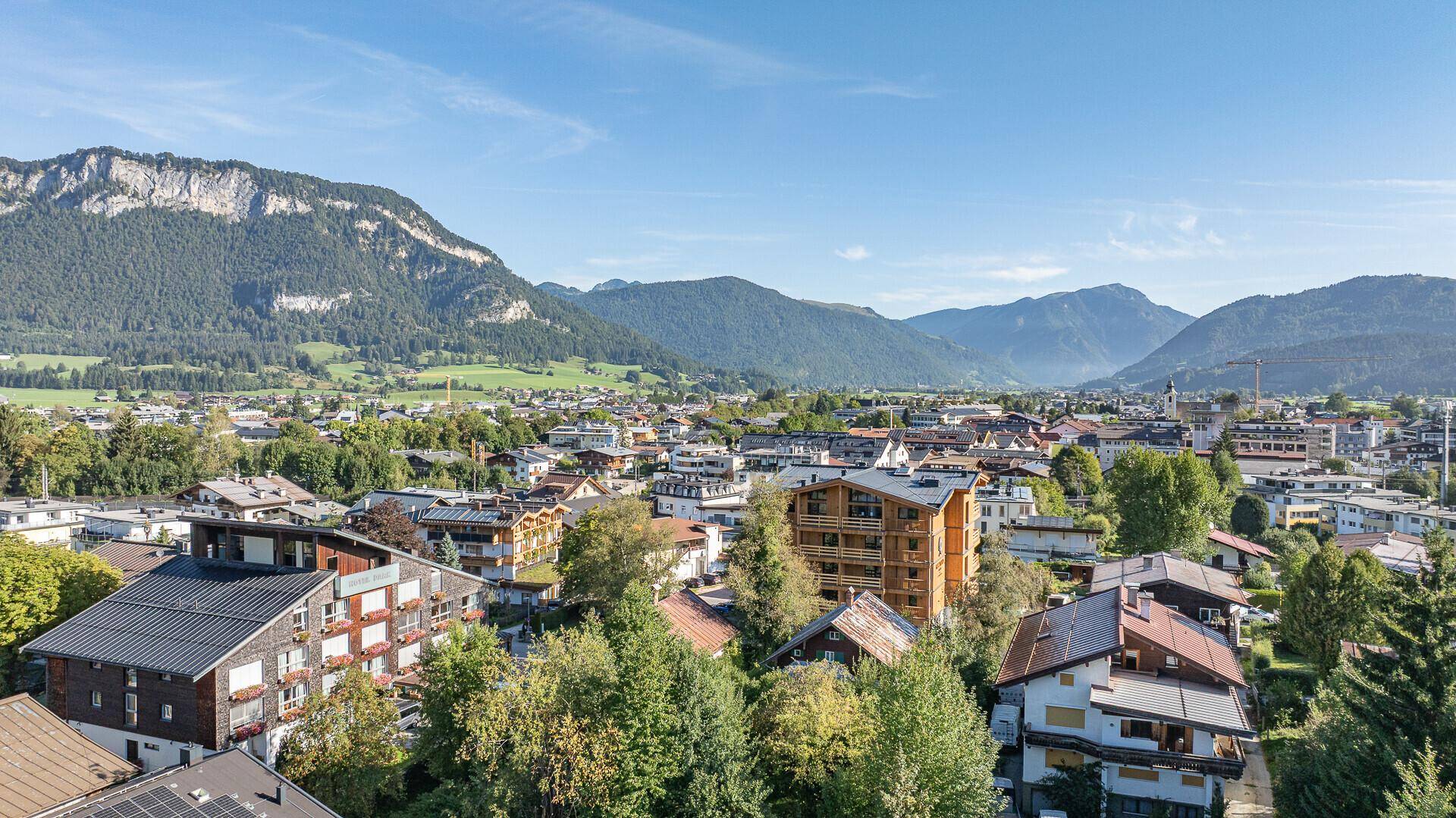 KITZIMMO-Baugrund in zentraler Toplage mit Apparthotel Projektierung - Immobilien St. Johann.