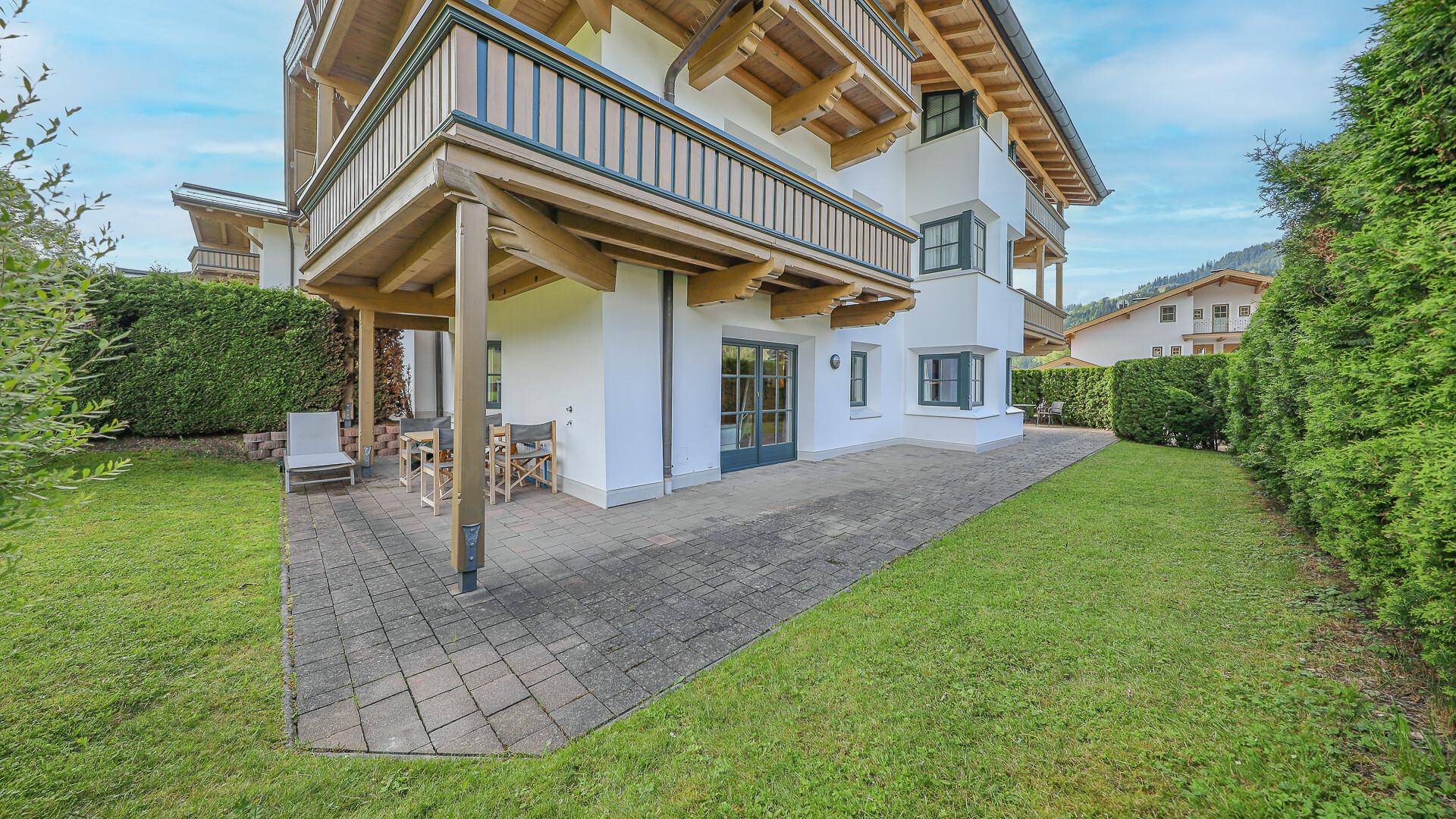 KITZIMMO-Exklusive Gartenwohnung in sonniger Ruhelage - Immobilien Kirchberg.