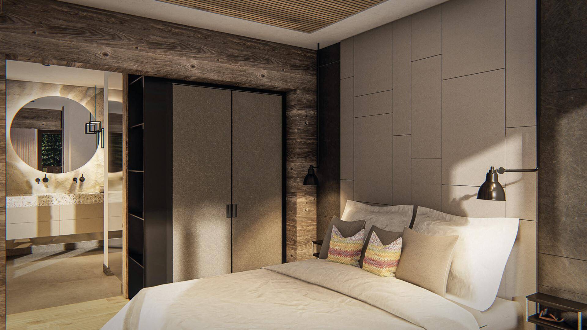 Schlafzimmer mit integriertem Kleiderschrank und Zugang zum modernen Badezimmer.