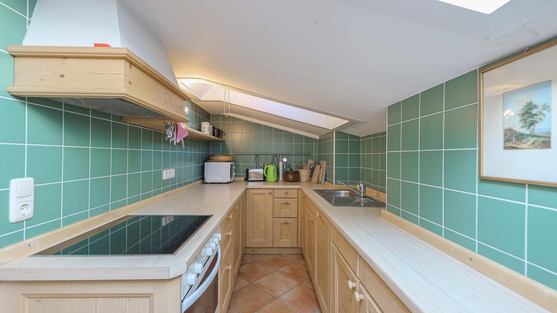 KITZIMMO-Gemütliche Dachgeschosswohnung in Toplage mieten - Immobilien Reith.