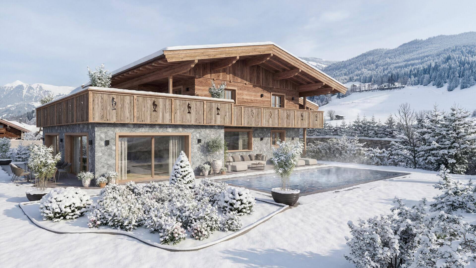 Winterliche Seitenansicht des Chalets mit verschneitem Poolbereich und Garten vor alpiner Kulisse.