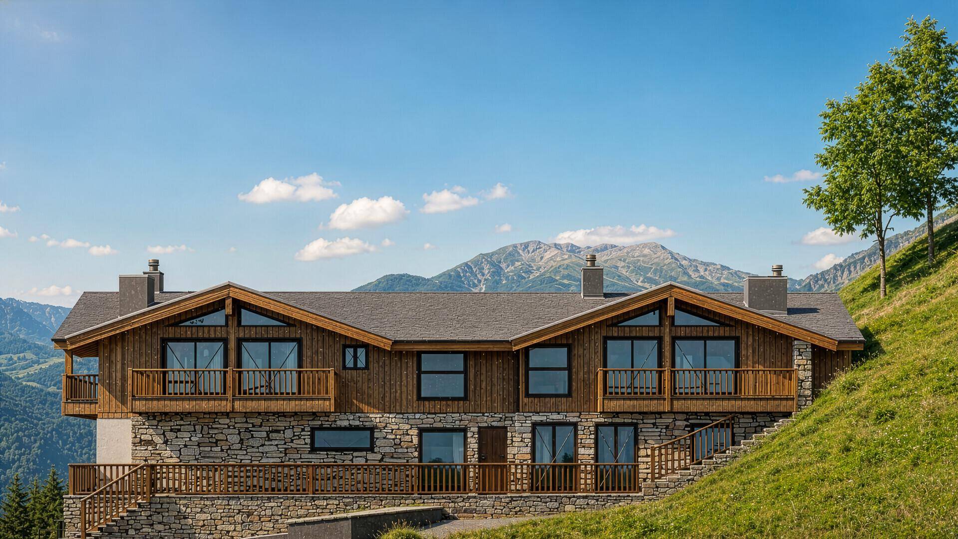 Beeindruckendes Chalet mit traditioneller Stein- und Holzarchitektur und weitem Bergblick.