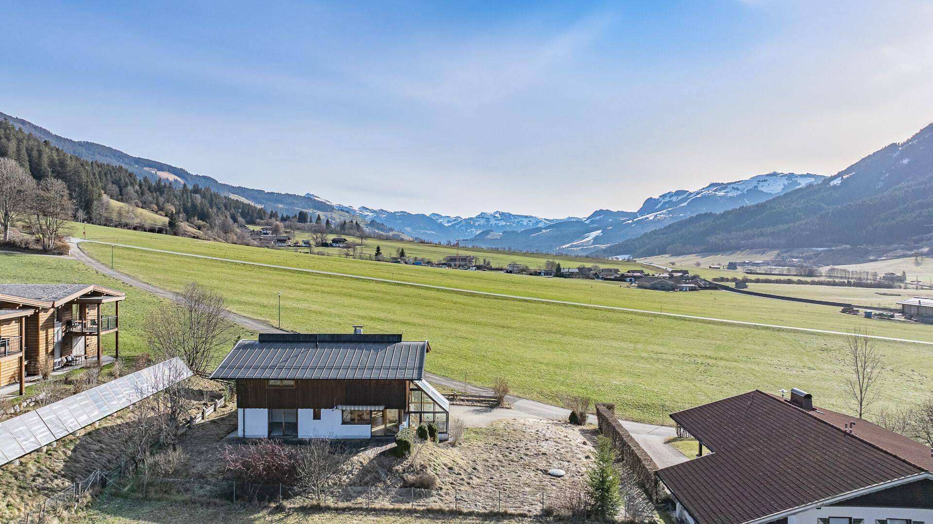 KITZIMMO-Baugrundstück mit Altbestand in Toplage - Immobilien Brixen im Thale.