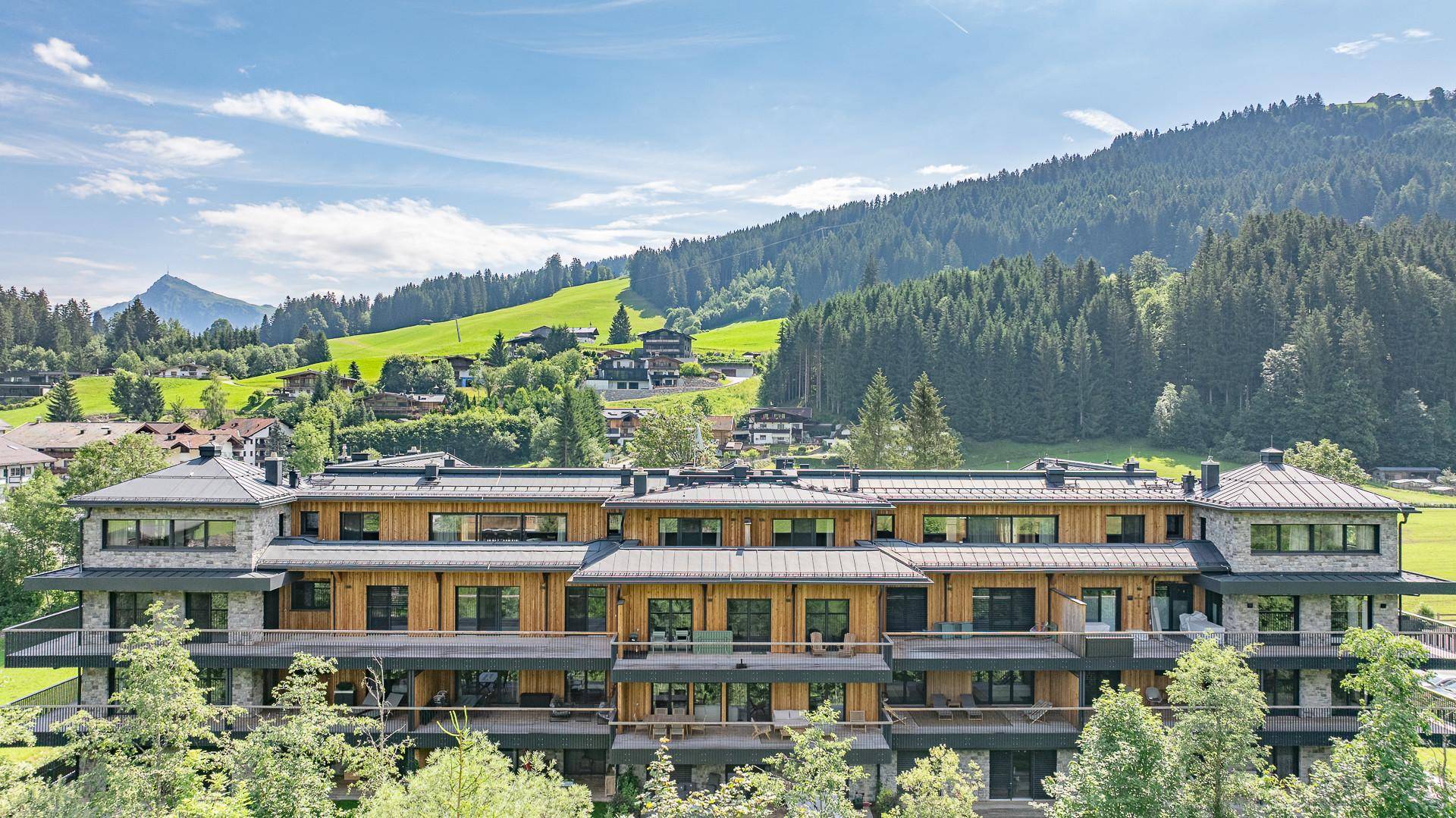 KITZIMMO-Riverside - Luxus-Garden-Suite in Toplage kaufen - Immobilien Kirchberg.