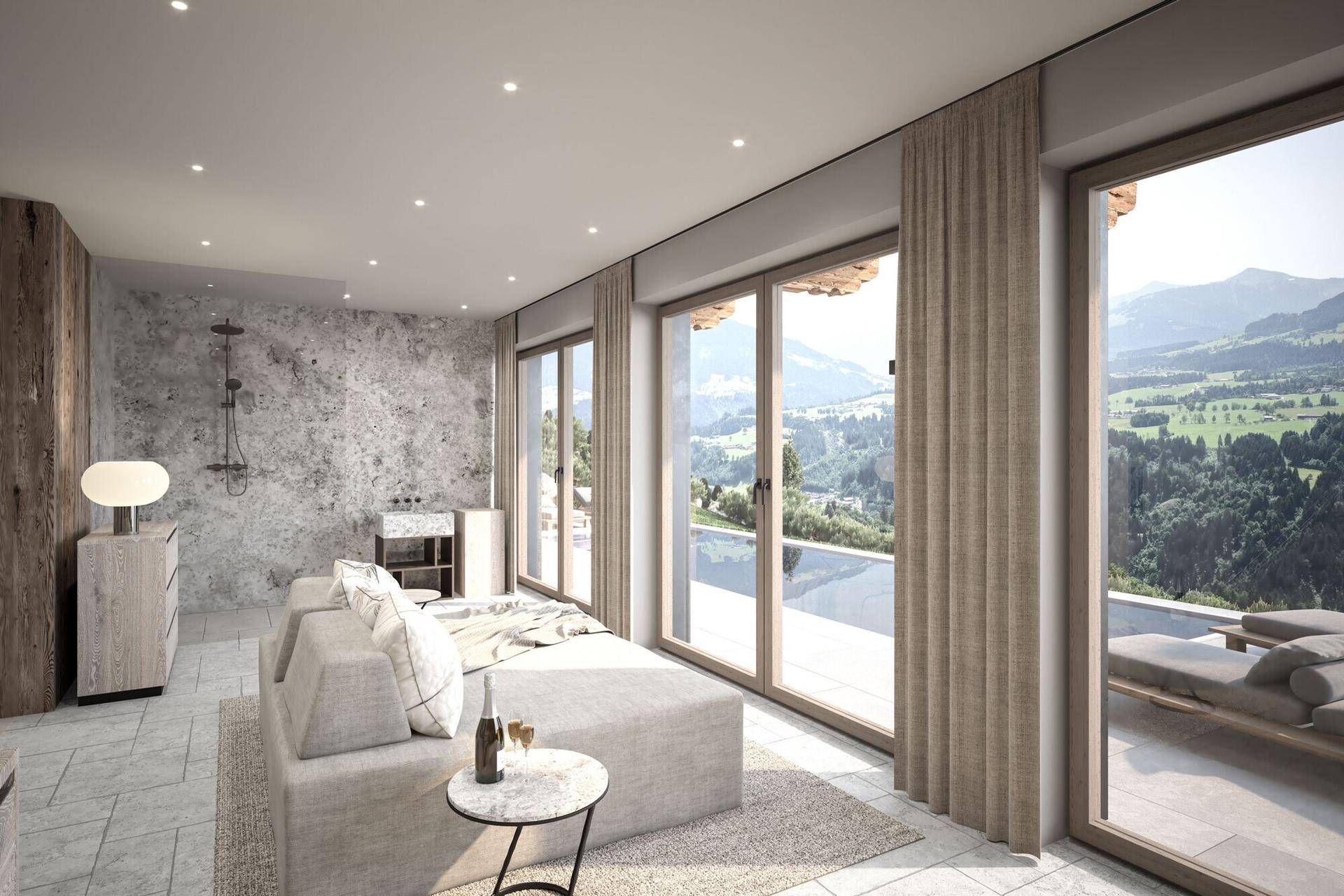 Moderner Wellnessbereich mit großzügigen Glasfronten, Dusche und entspannendem Bergblick.