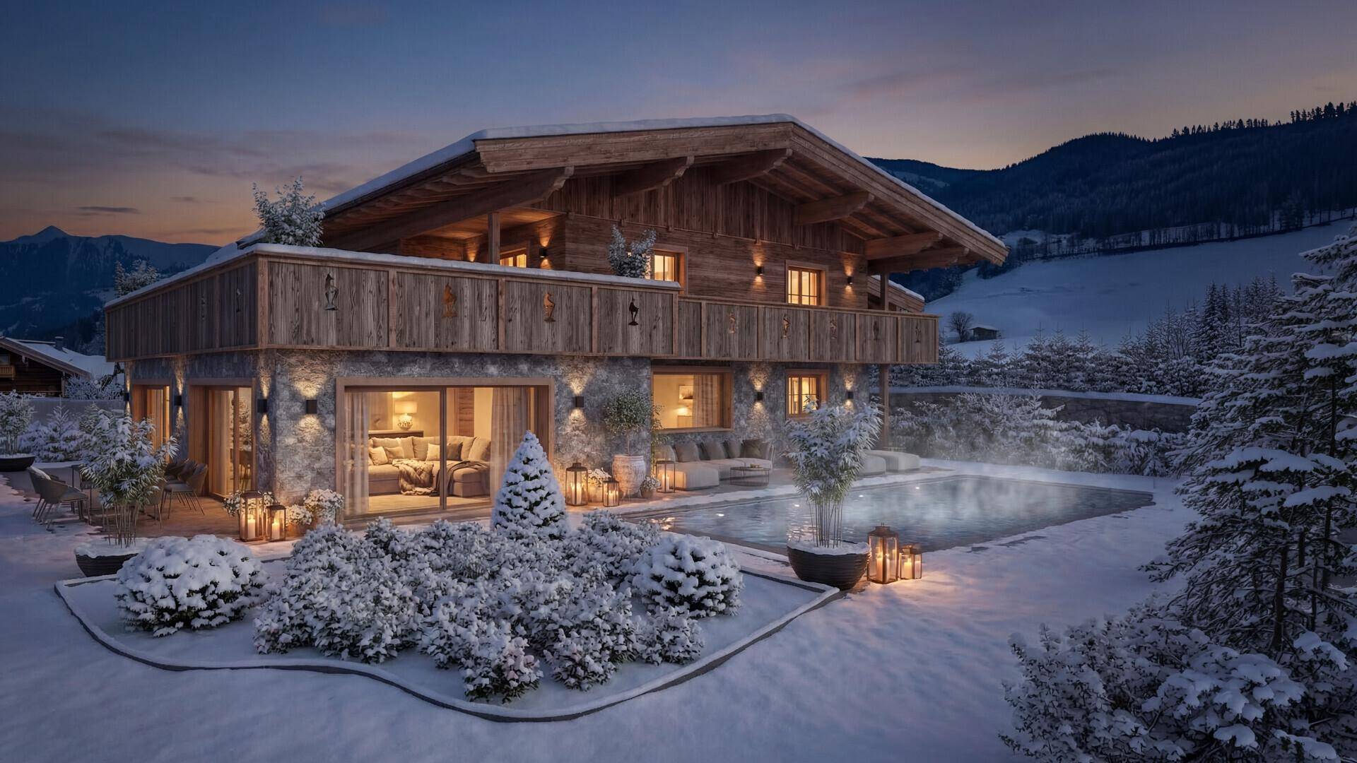 Abendliche Ansicht des Chalets im Winter mit beleuchtetem Poolbereich und gemütlicher Atmosphäre.
