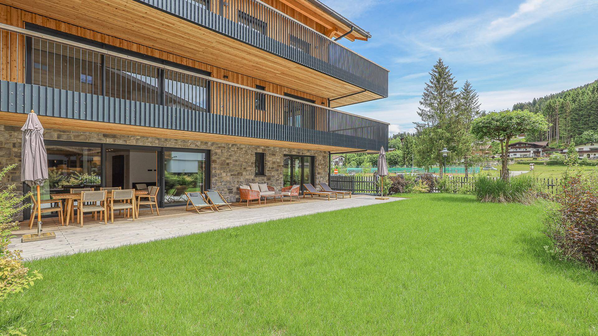 KITZIMMO-Riverside - Luxus-Garden-Suite in Toplage kaufen - Immobilien Kirchberg.