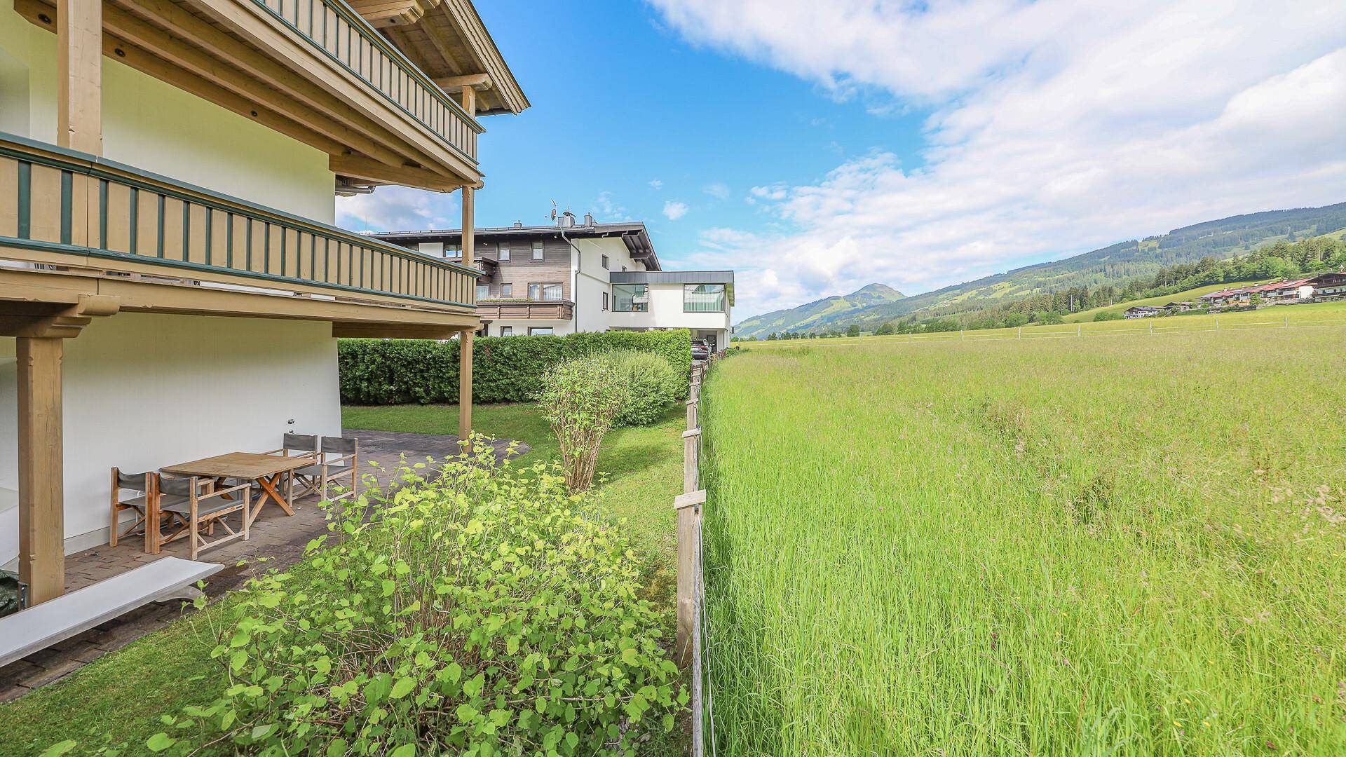 KITZIMMO-Exklusive Gartenwohnung in sonniger Ruhelage - Immobilien Kirchberg.