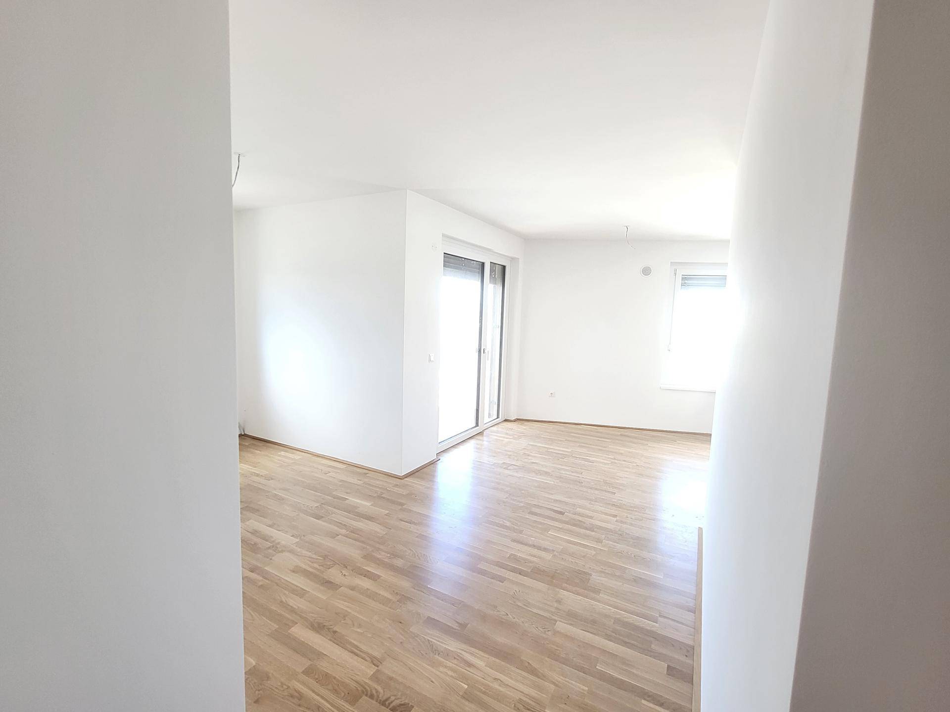 Blick vom Vorraum in Wohnküche Top 14