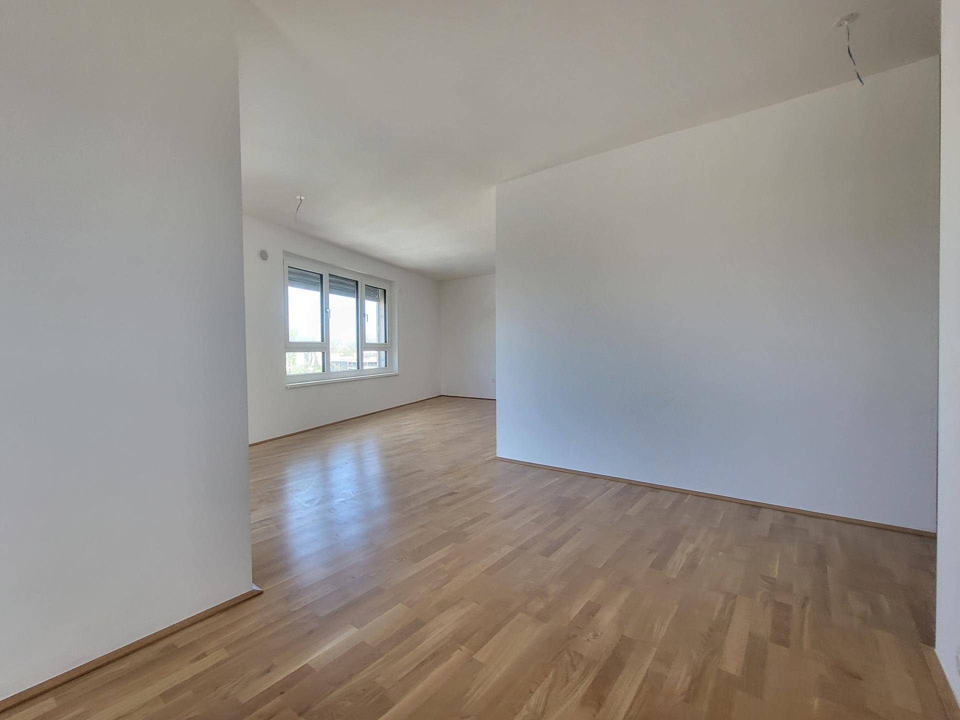Blick vom Küchenbereich ins Wohnzimmer Top 14
