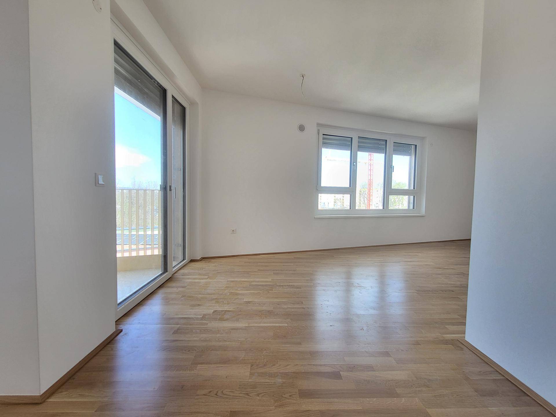 Blick vom Vorraum ins Wohnzimmer Top 14