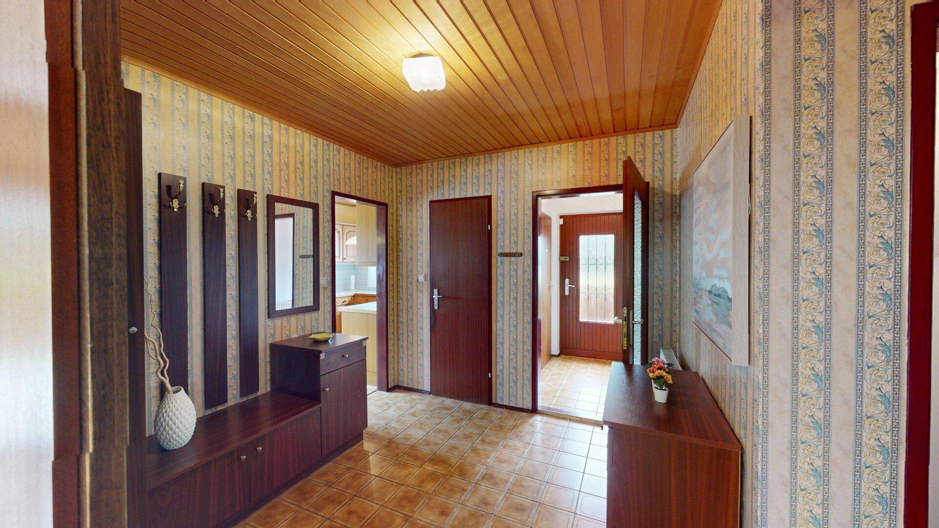 Charmantes Einfamilienhaus mit Garten und Garage in Wien-Eßling – mit Modernisierungspotenzial - Ansicht 3